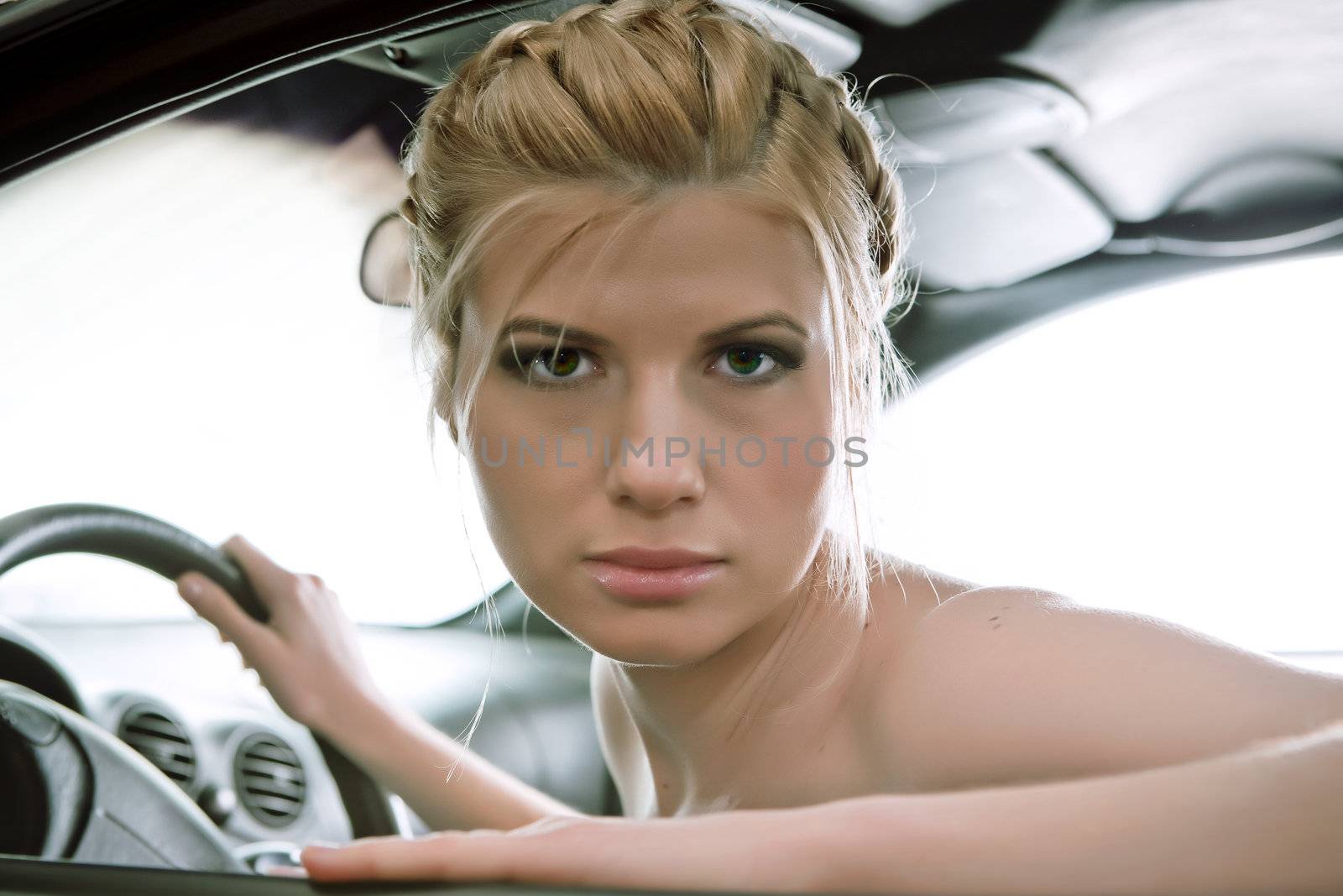  Young sexual blonde in the car. by vladimir_sklyarov
