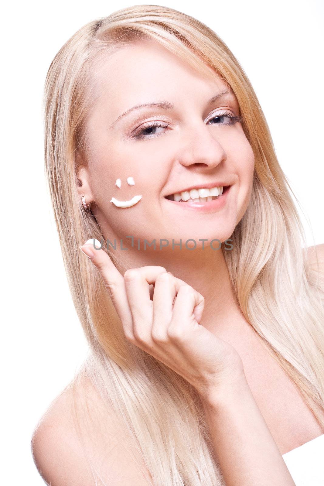 beautiful woman with cream on a white background