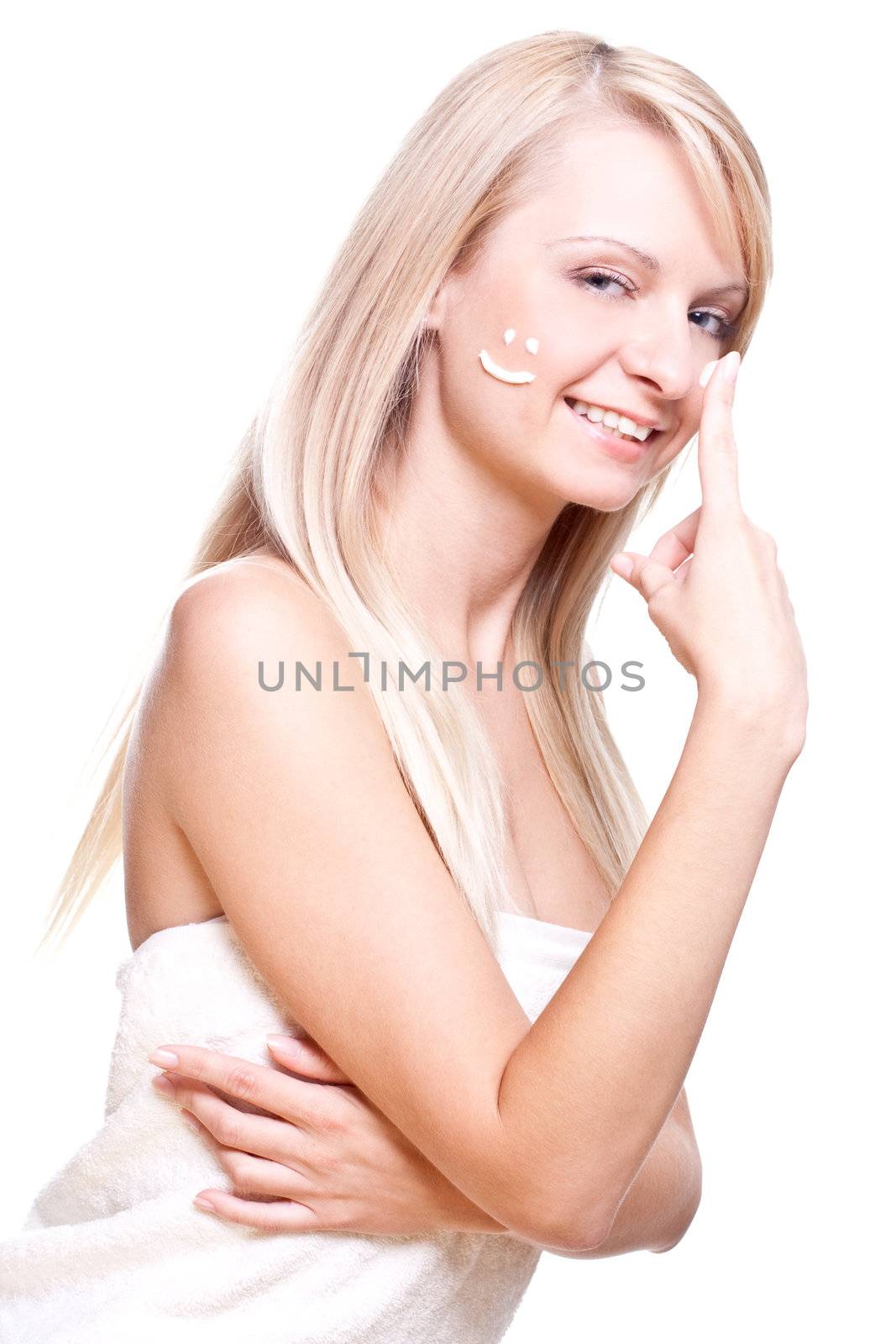 beautiful woman with cream on a white background