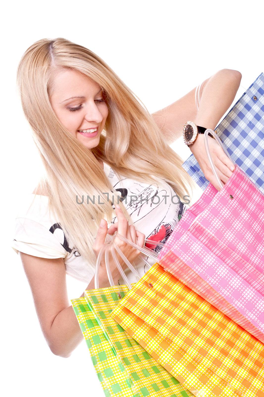 beautiful young woman shopping on a white background