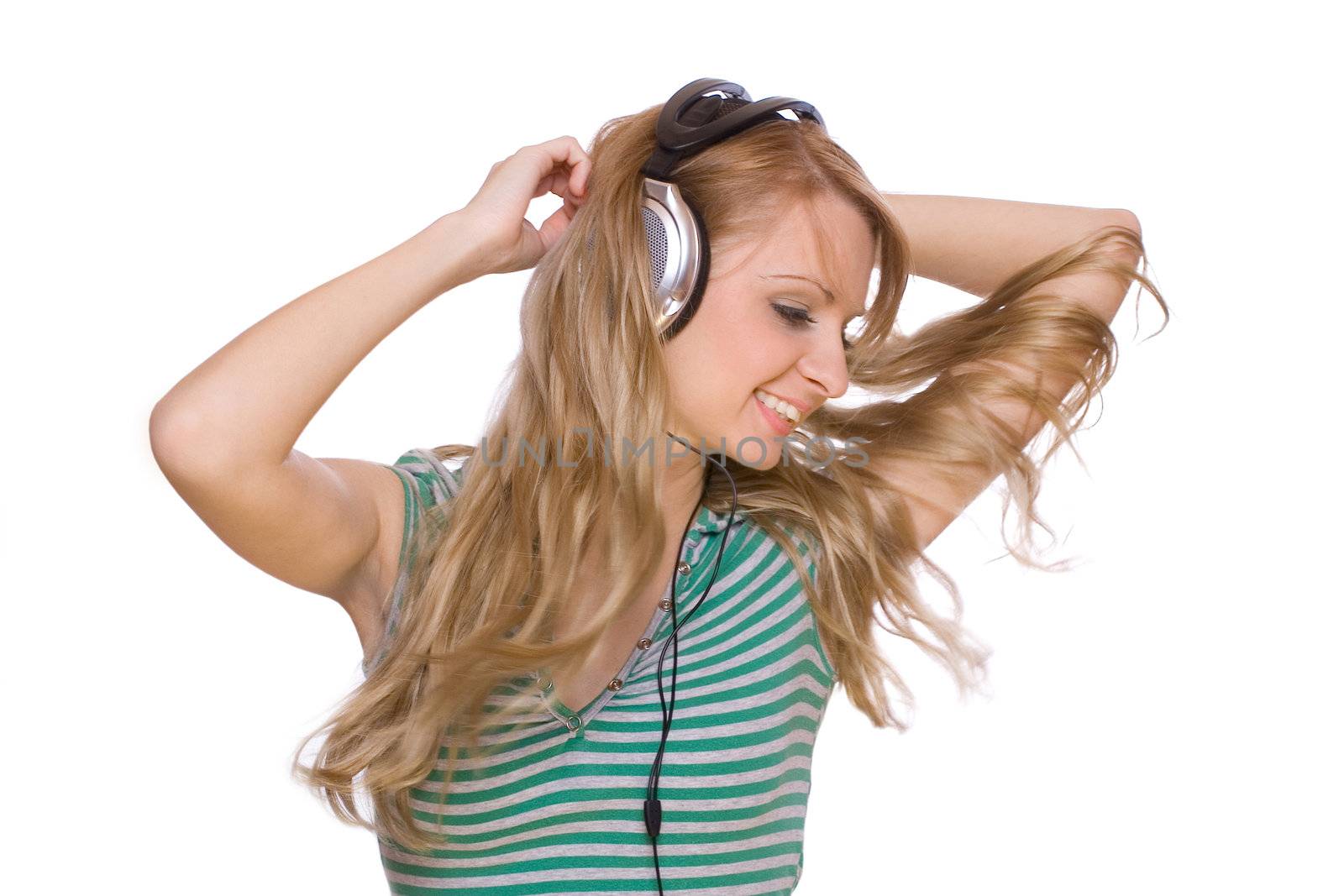 smiling young girl listening to music