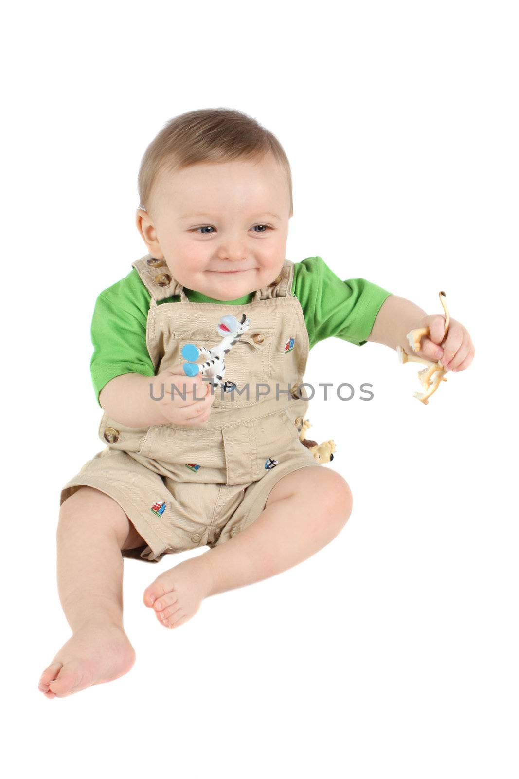 Cute baby boy wearing a safari outfit