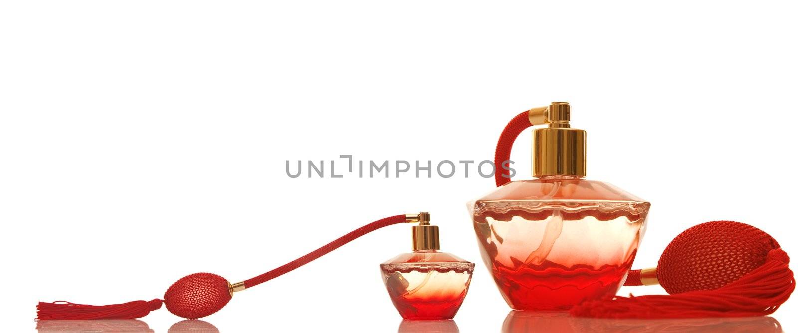 Perfume in a red glass bottles by VictorO