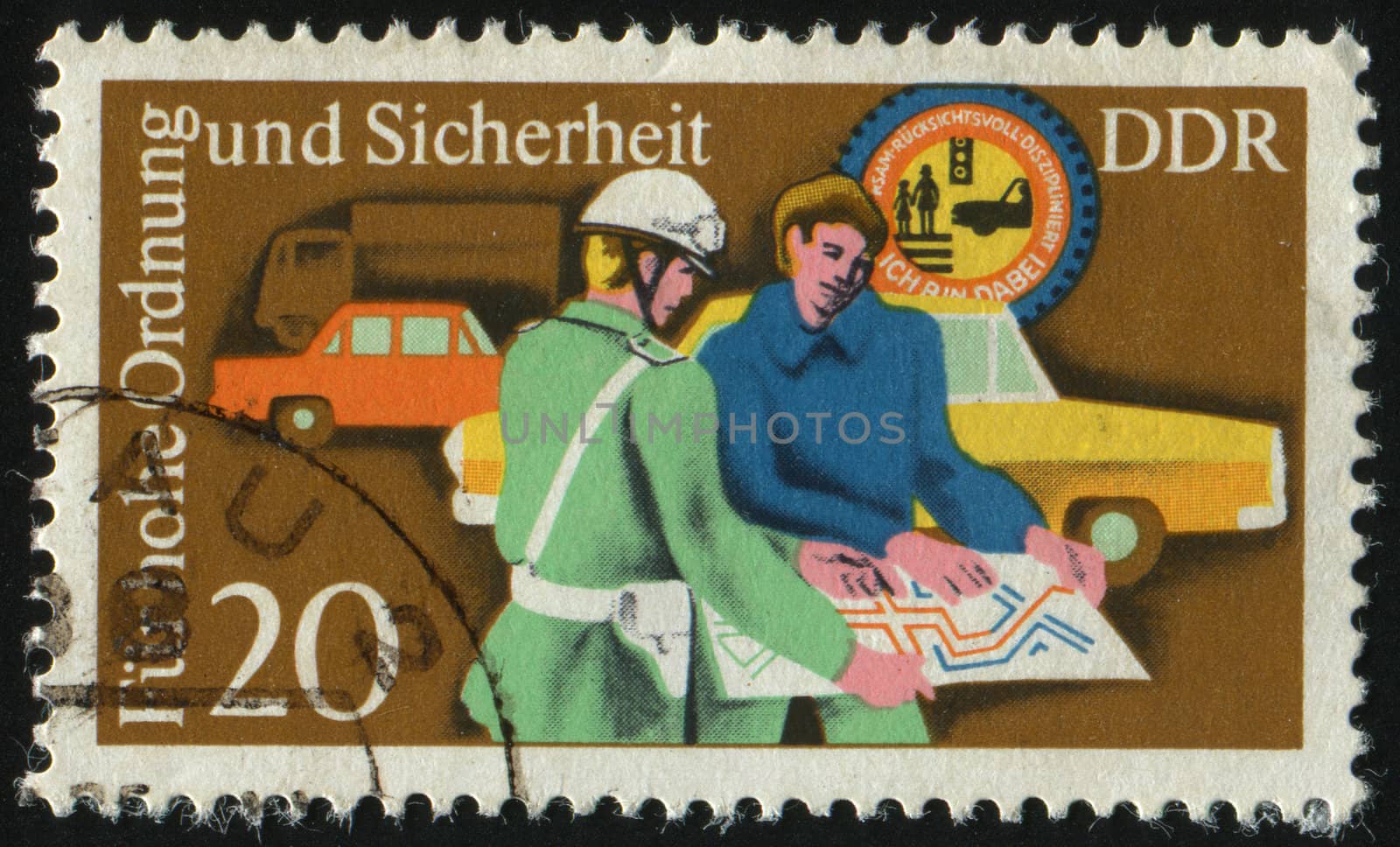 GERMANY- CIRCA 1975: stamp printed by Germany, shows policeman helping motorist, circa 1975.