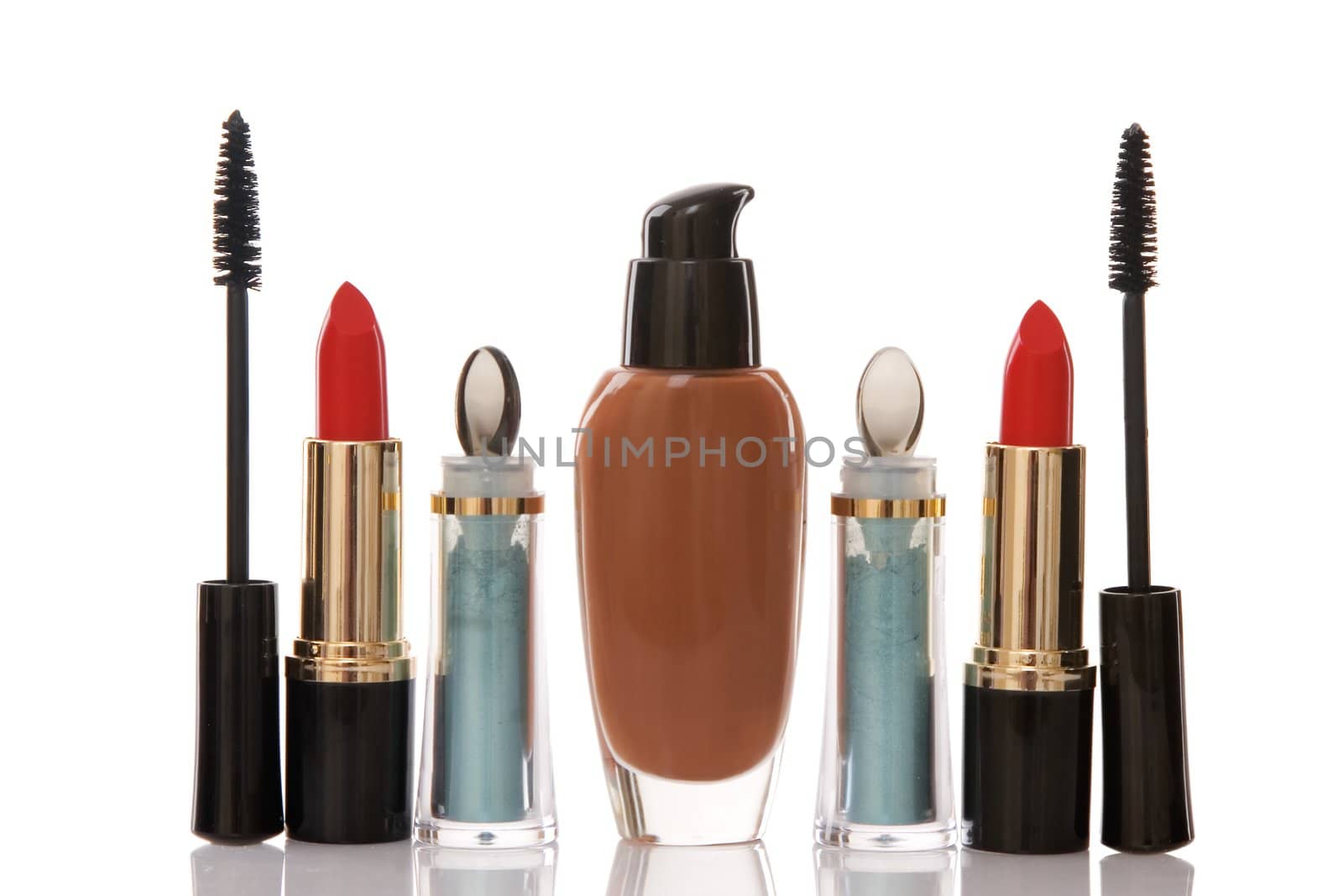 red lipstick and cosmetics on white background, beauty concept