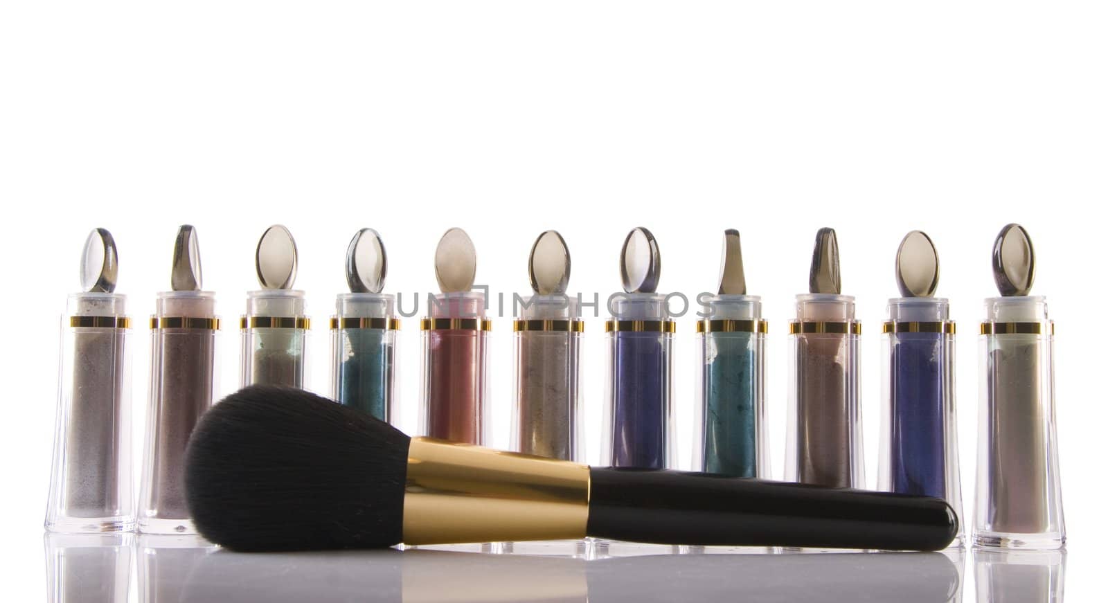 brush and cosmetics on white background, beauty concept