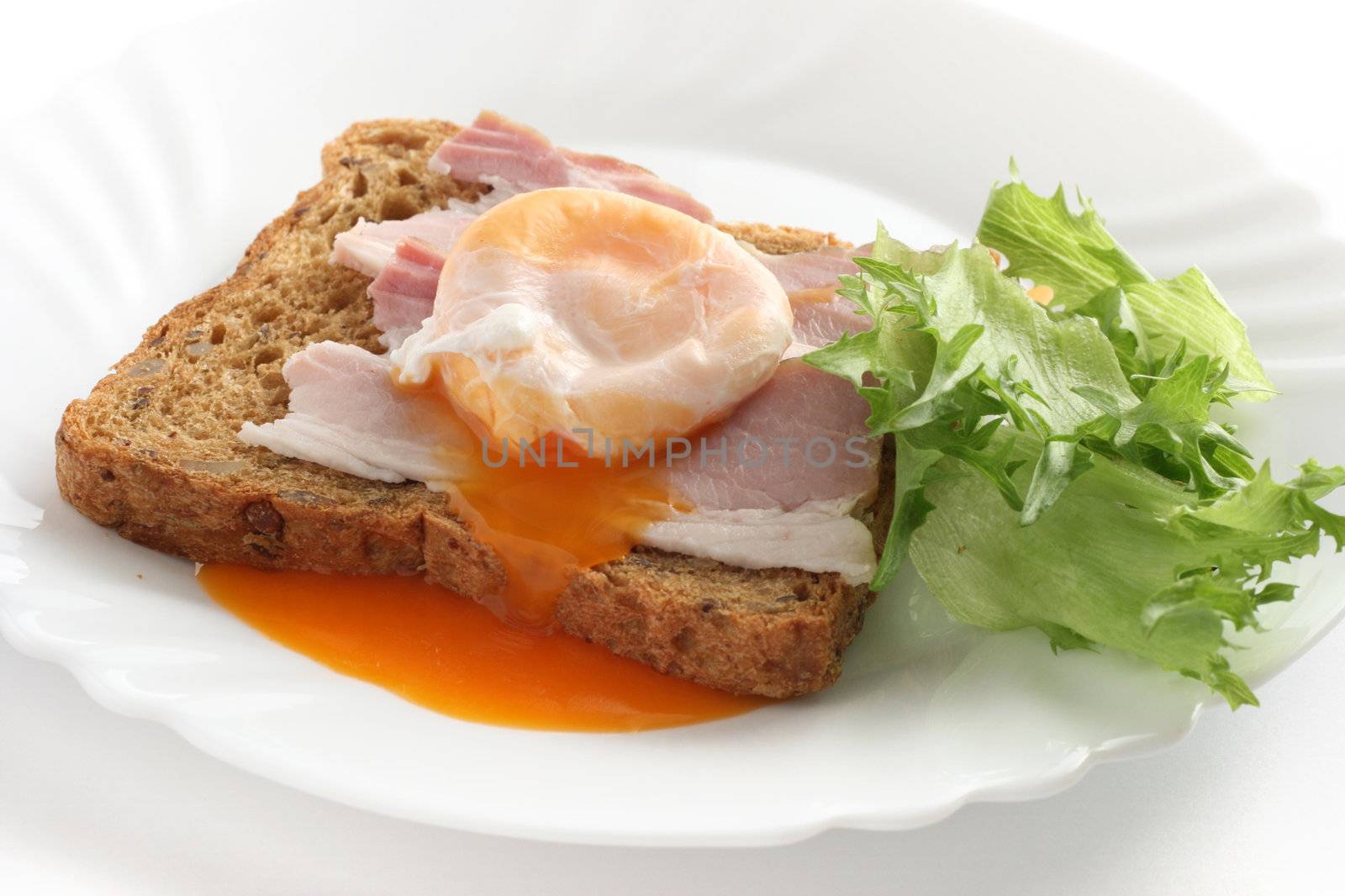 bread with egg on a plate