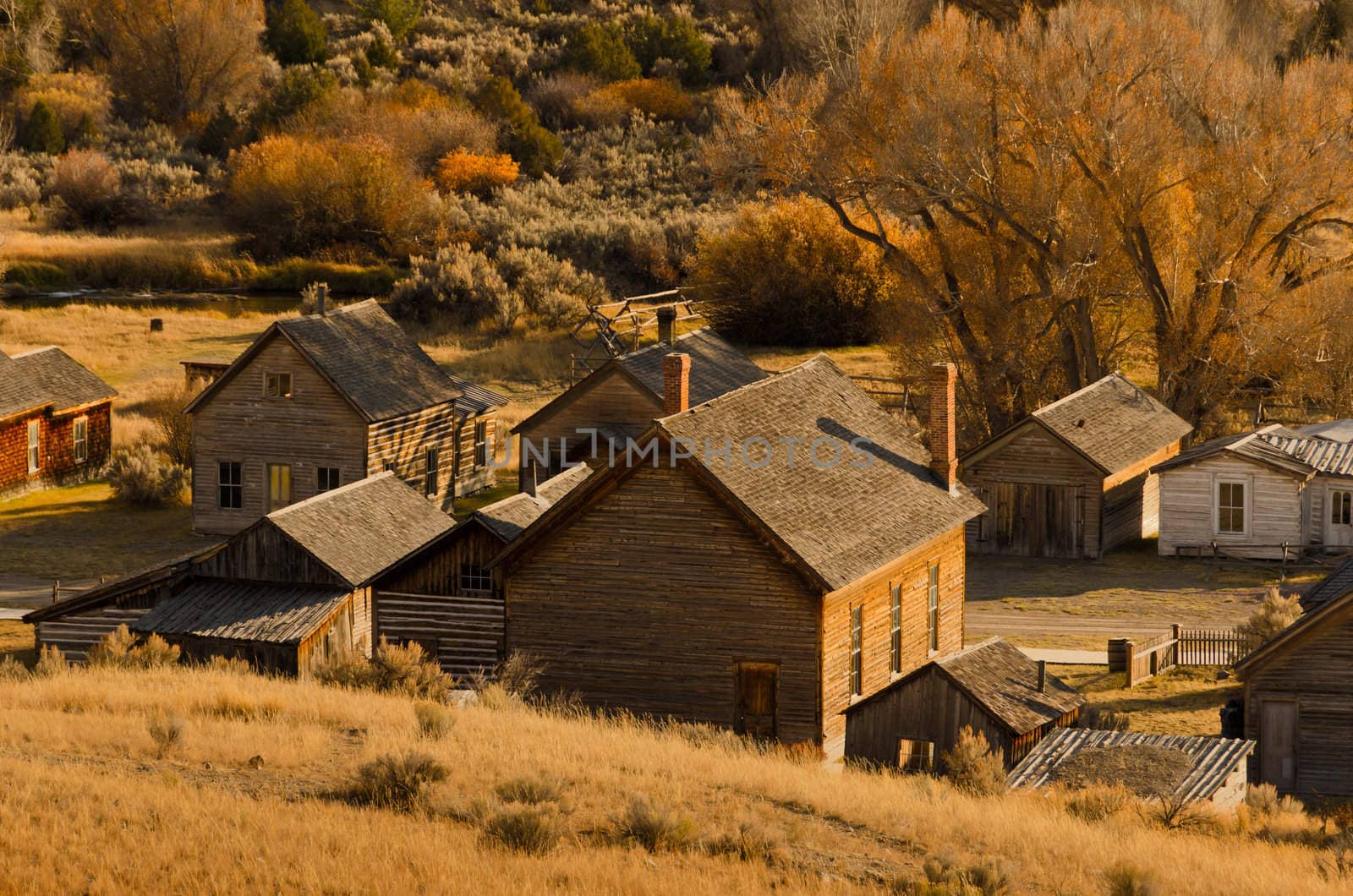 Historic houses in late afternoon light, Bannack State Park, Montana, USA