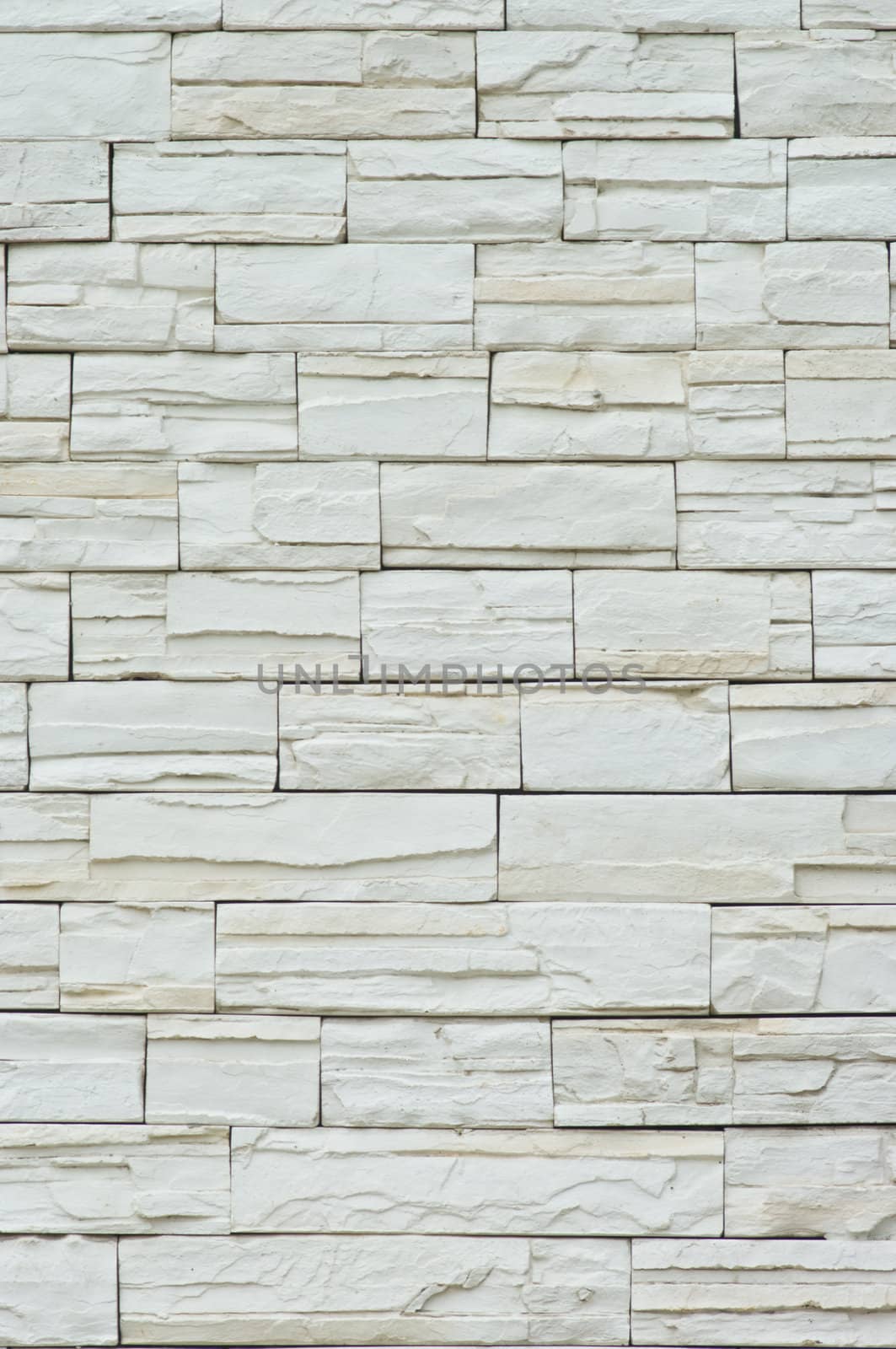 Decorative wall with stone tiles, Texture background