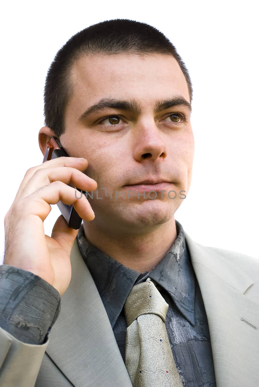 young handsome man talking on his mobile phone