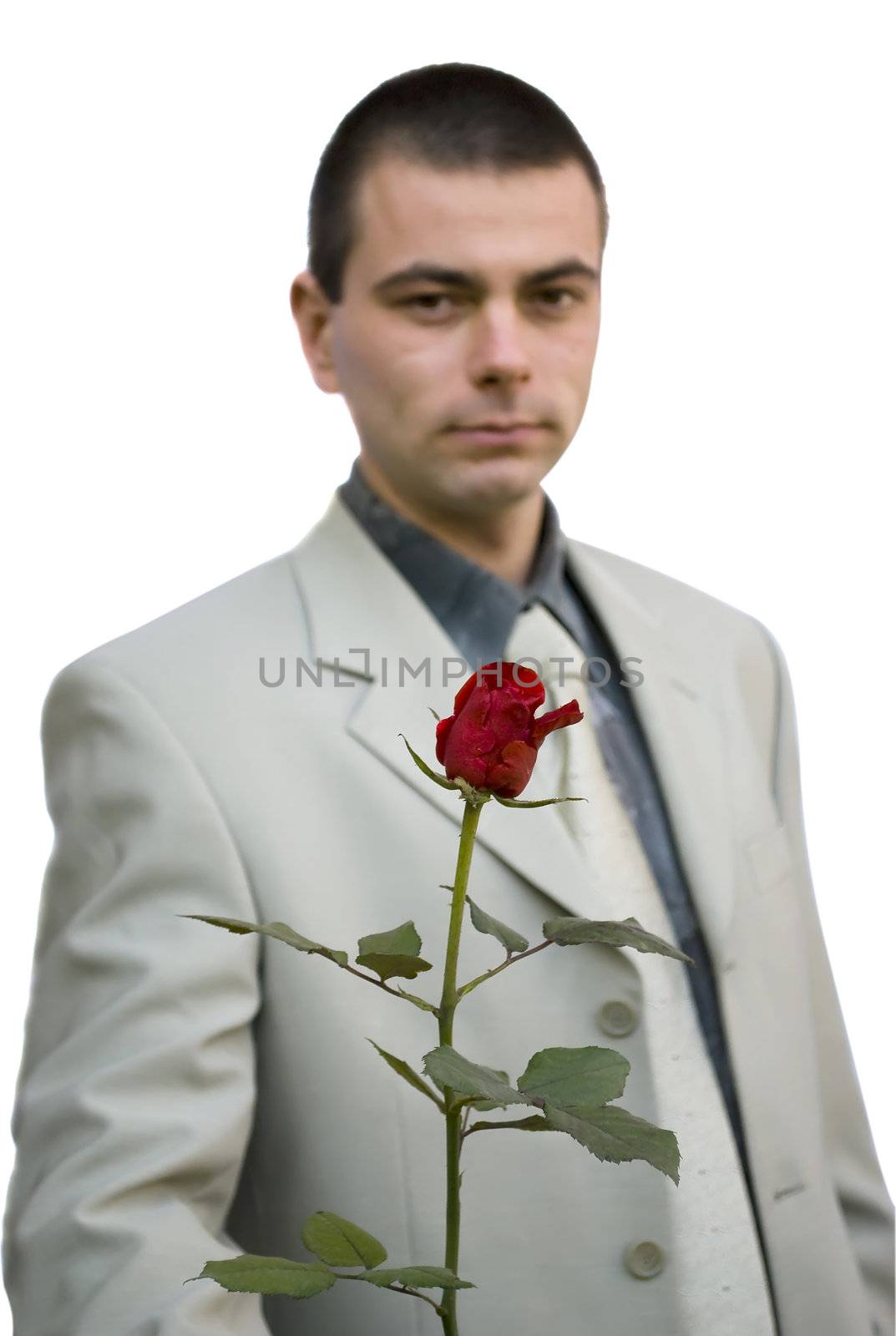 young business man holding red rose in hand
