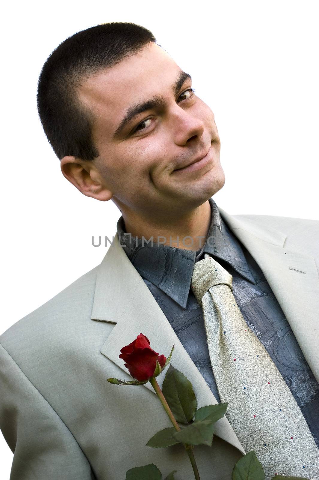 young romantic business man holding red rose in hand