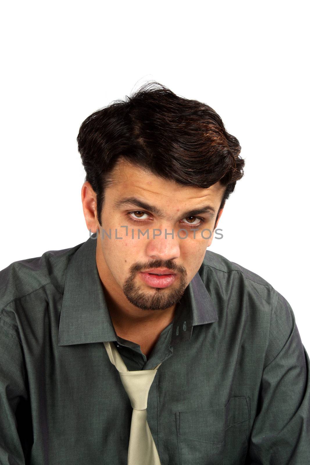 A portrait of a tired Indian businessman, on white studio background.