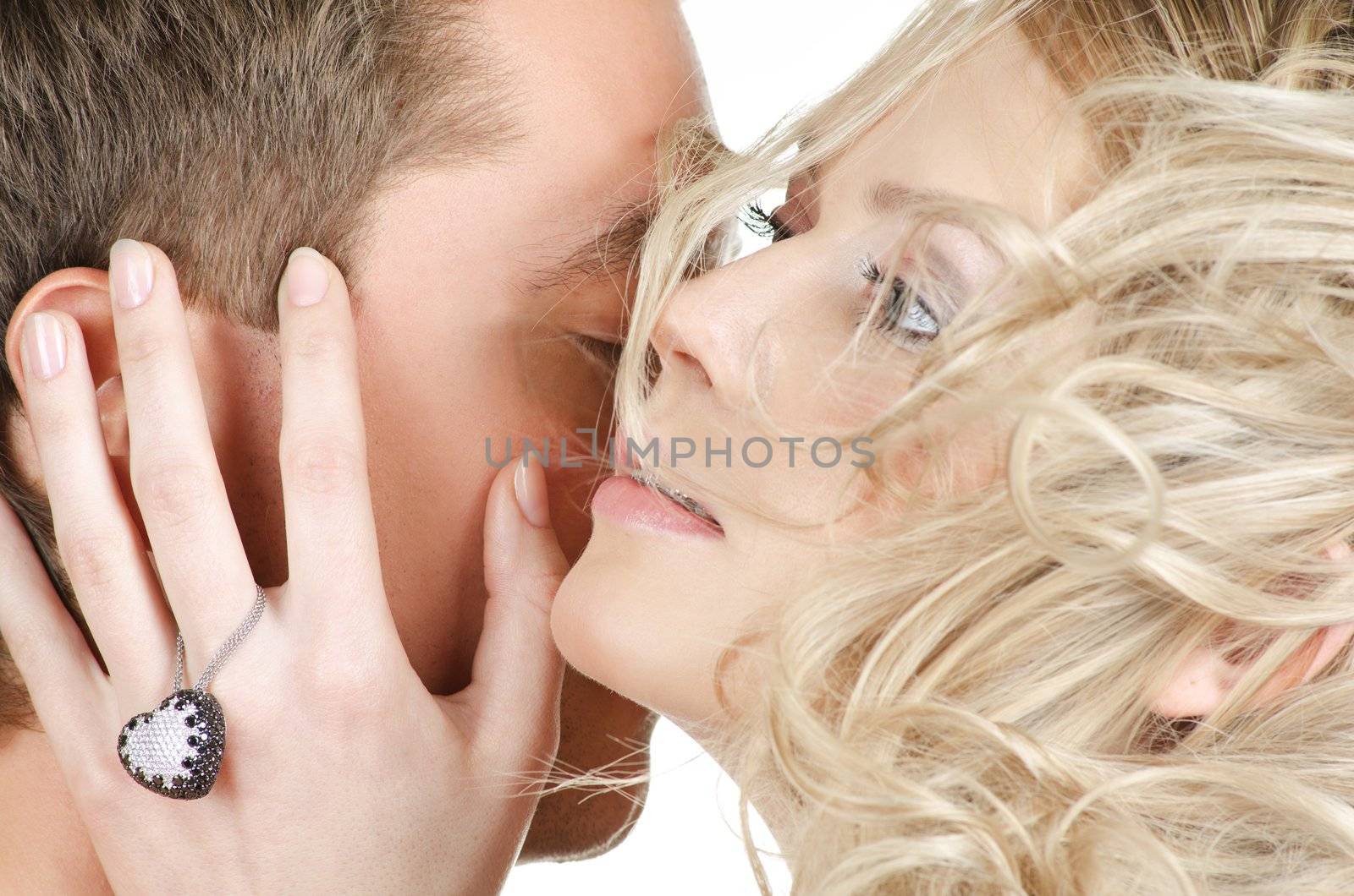 Beauty man and woman - lovers closeup portraits