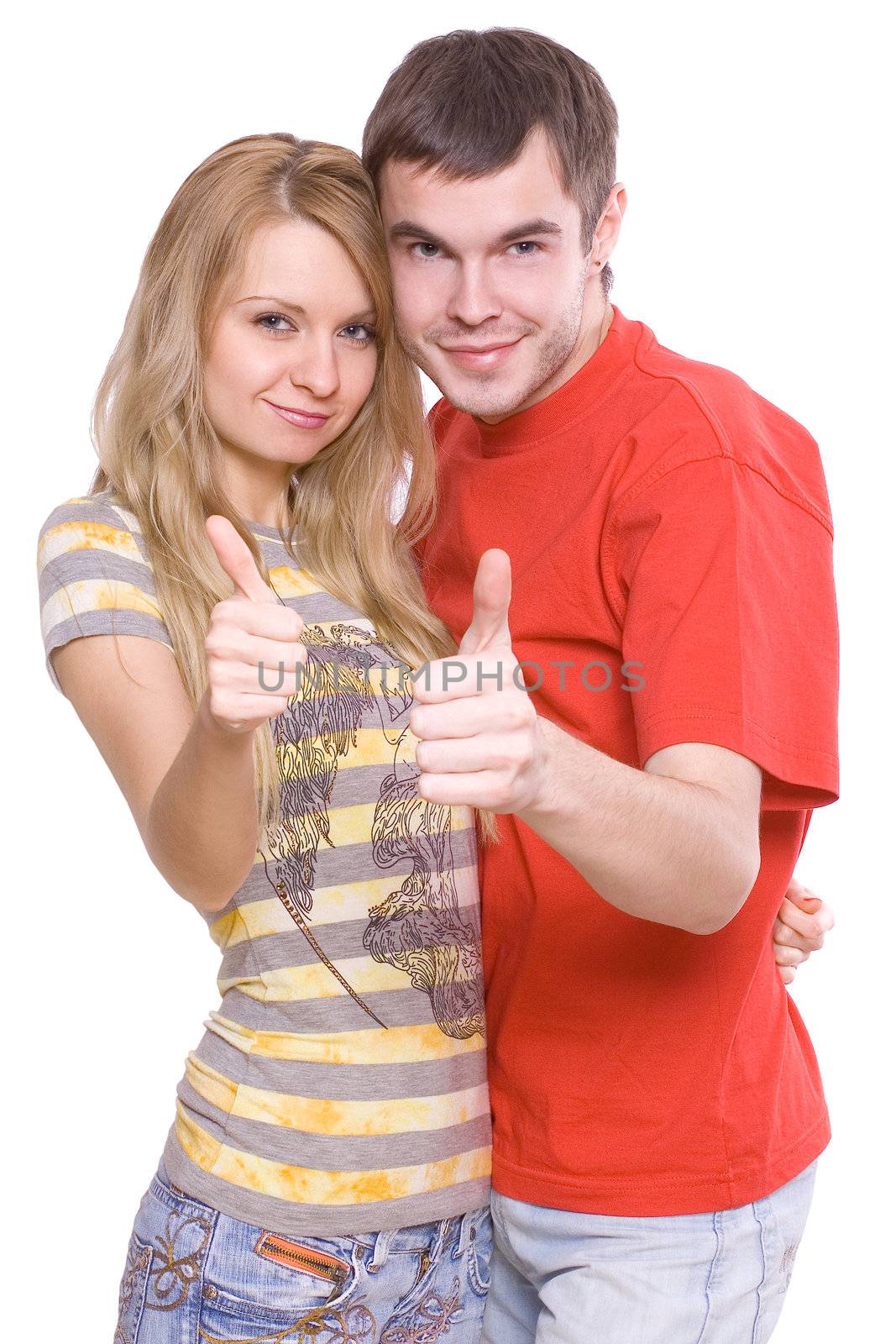 young happy couple giving a "thumbs-up"