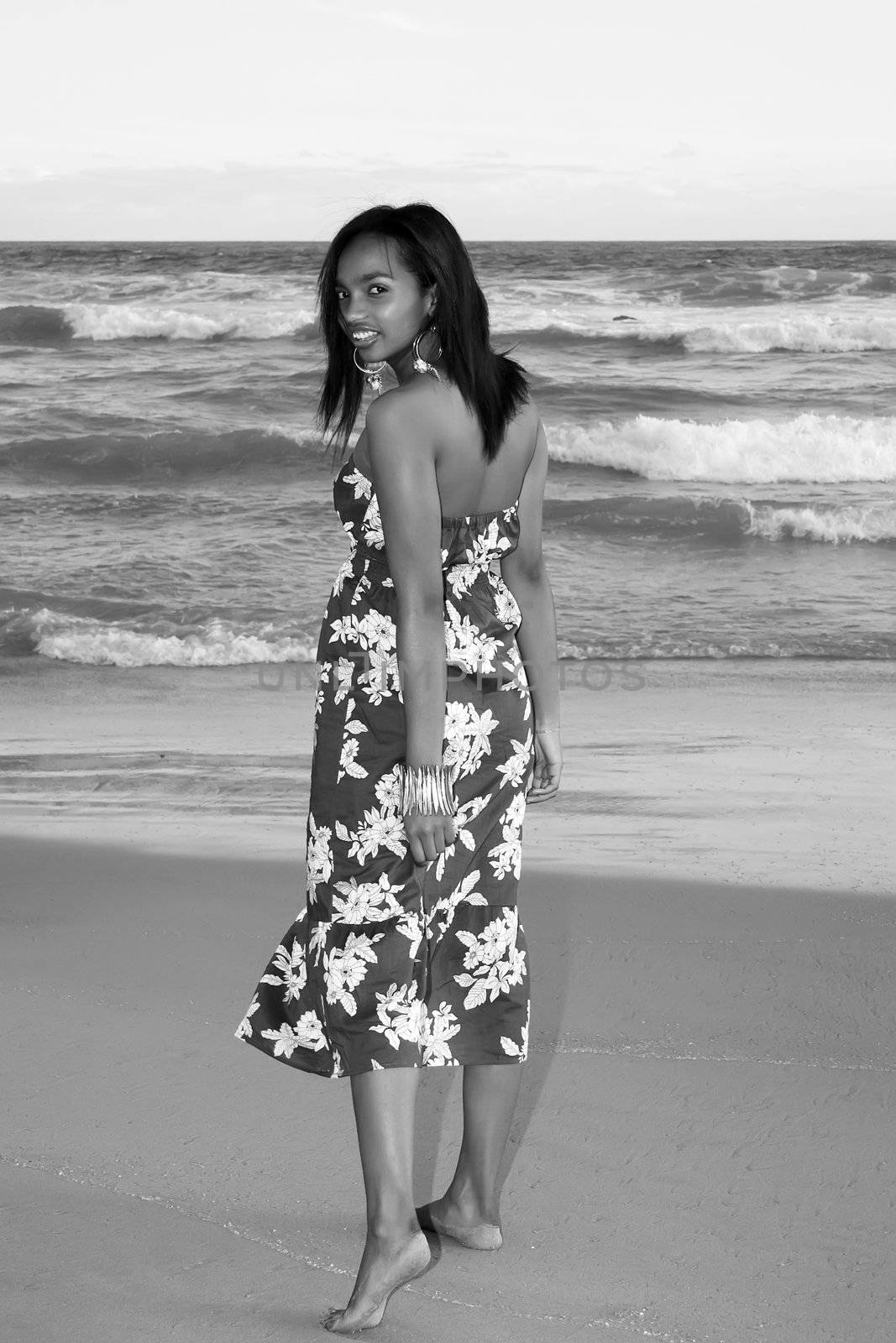 Black and White shot of an Ethnic model posing in a floral dress