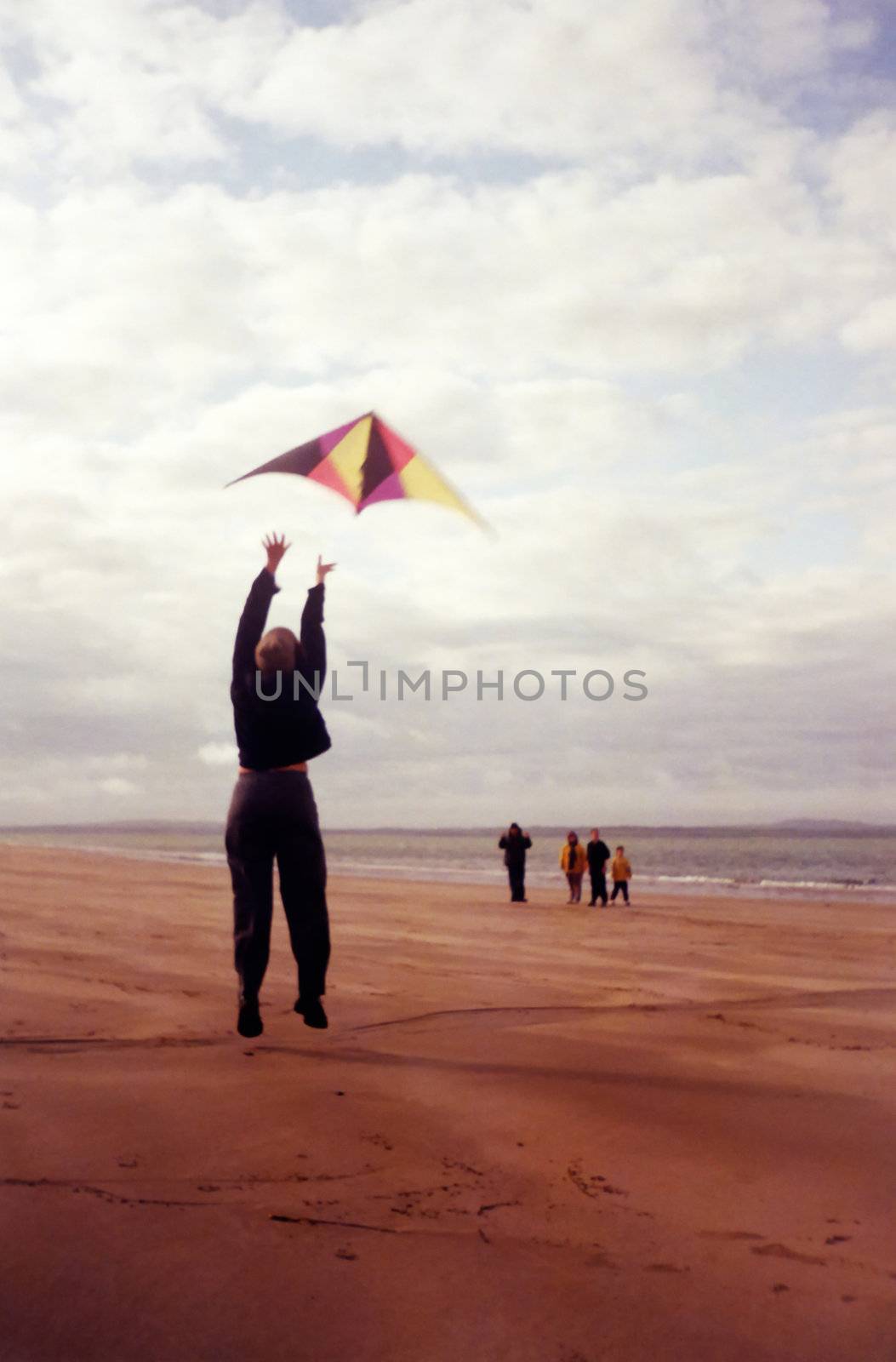 a jump for joy on the beach