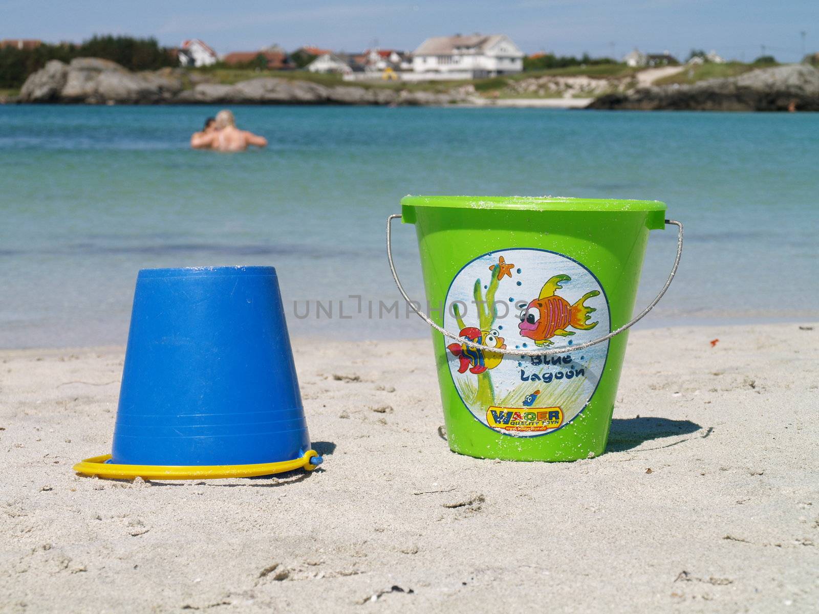 buckets on the beach