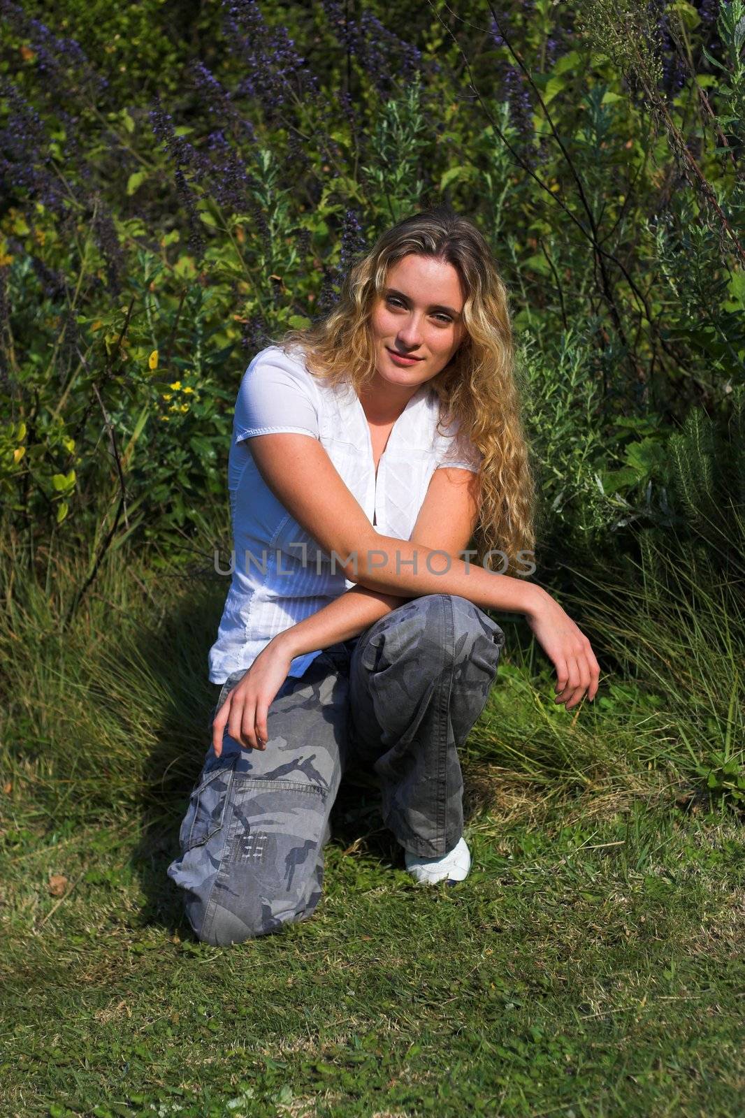 Girl showing some attitude in the garden