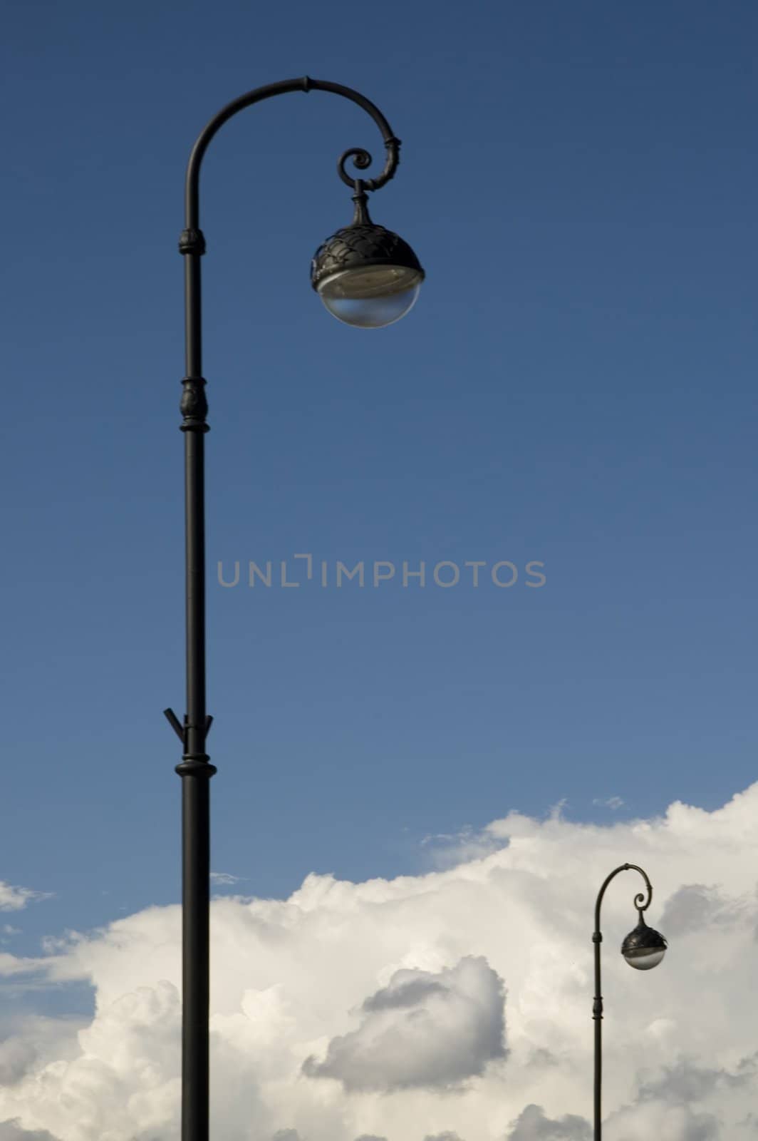 Two lanterns and white clouds