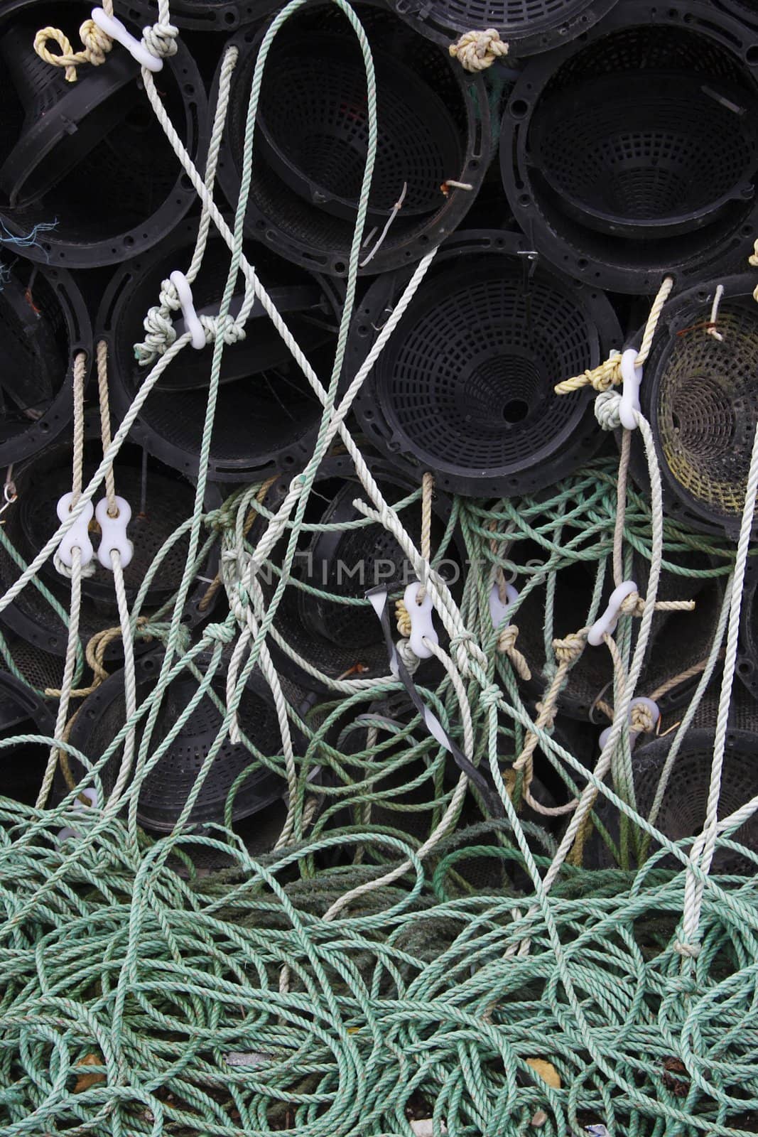 a tangled web of lobster pots and ropes
