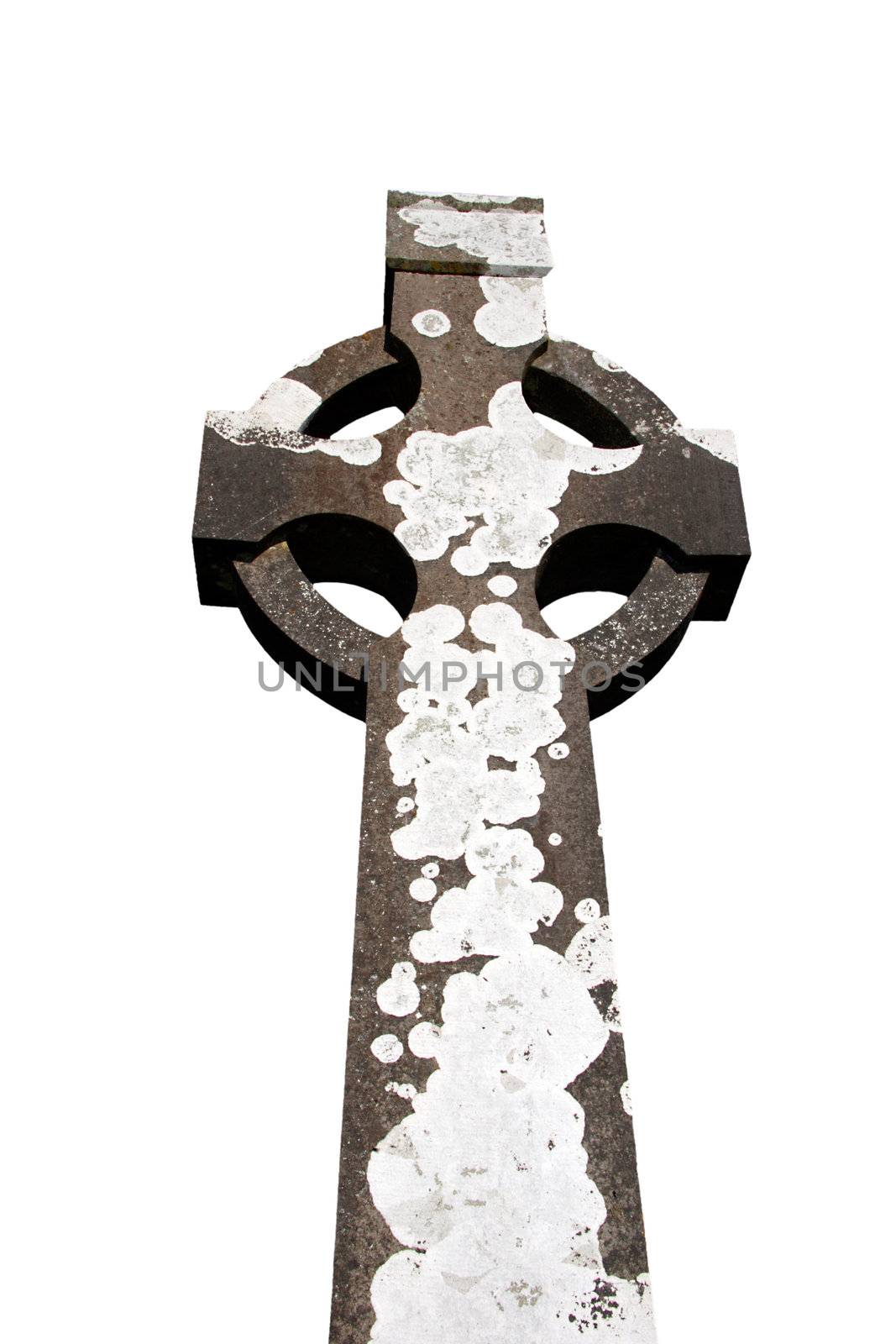 a celtic cross in an irish graveyard