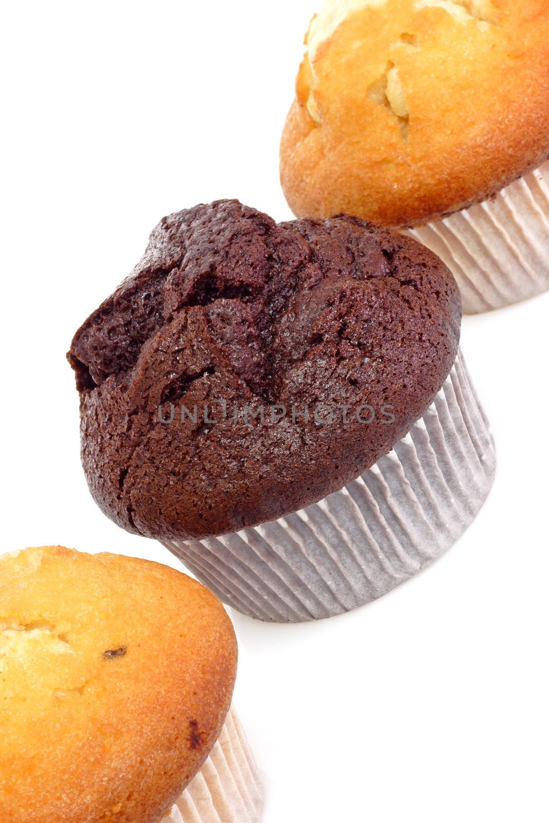 Fresh Muffins isolated on white background