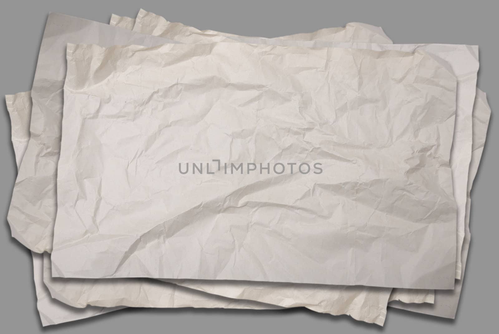 Empty old Crumpled paper on gray background