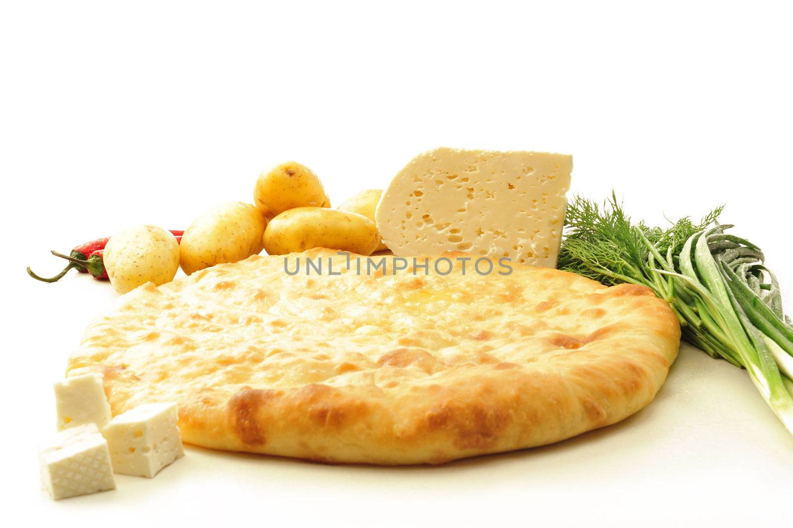  food composition made of flat cake, potato, cheese and spring onion