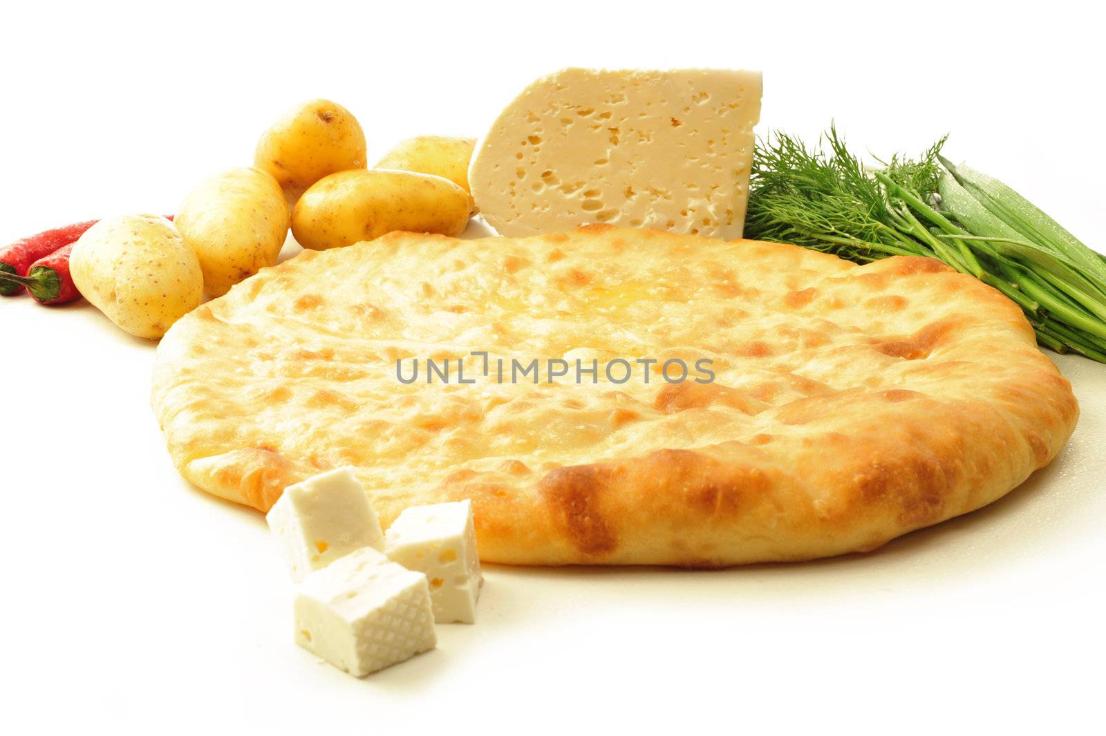  food composition made of flat cake, potato, cheese and spring onion