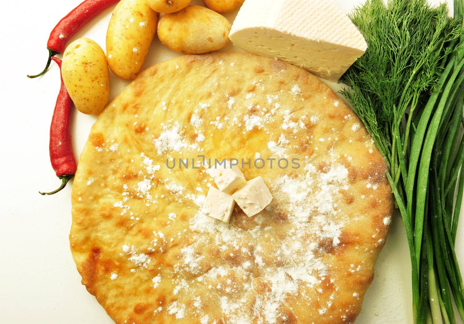  food composition made of flat cake, potato, cayenne, cheese