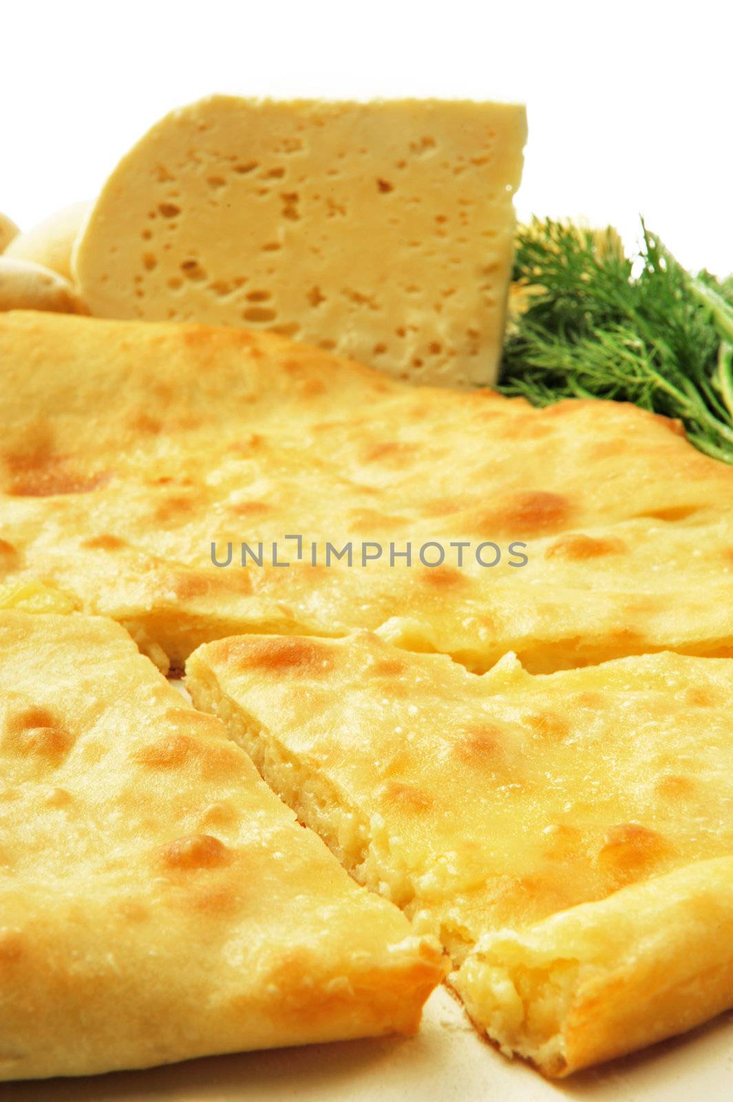  food composition made of flat cake,  cheese and parsley