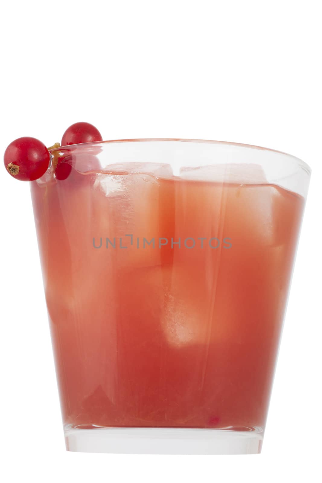 Healthy red juice drink with red currant berries as garnish, isolated on a white background.