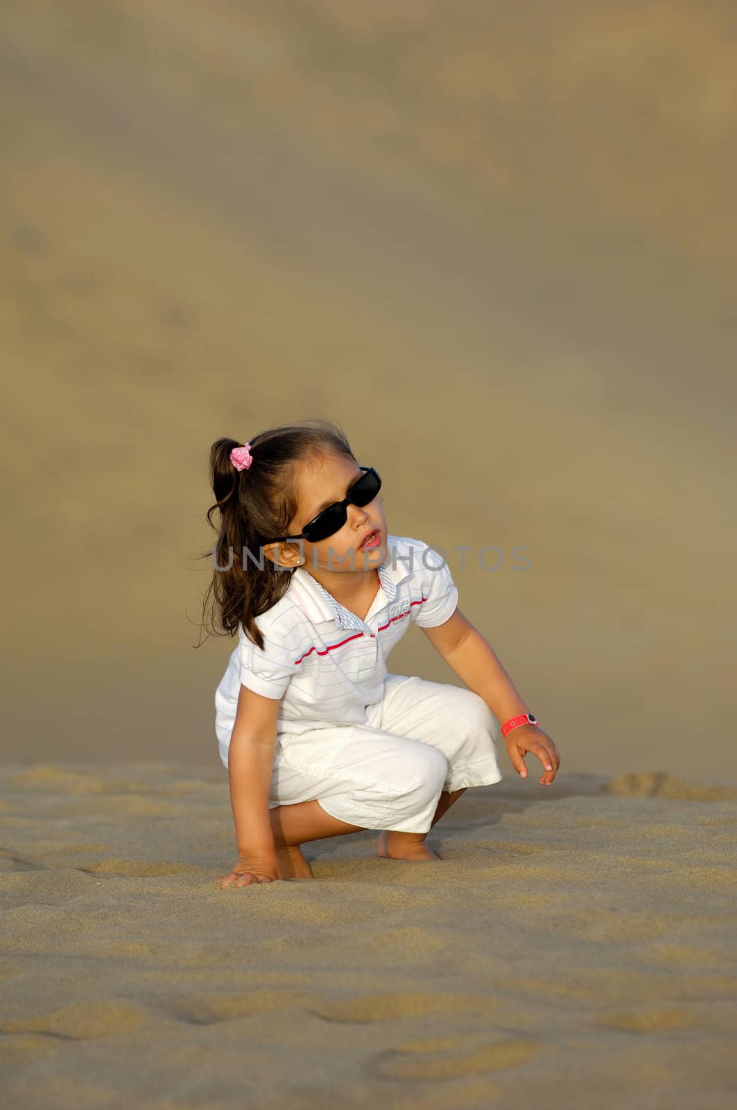 Child in desert by cfoto