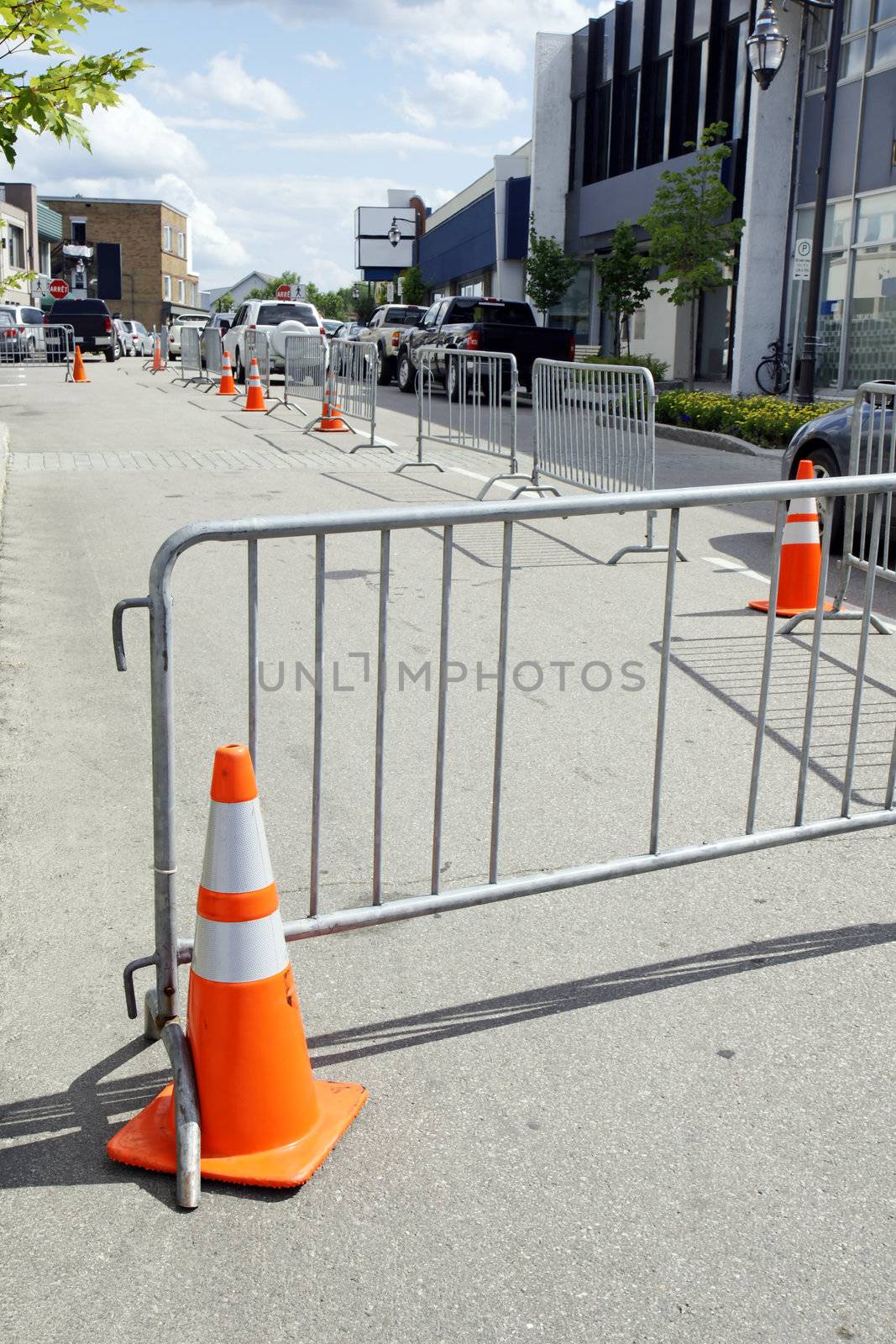 Detour: Close-up business street of a small town for an event.