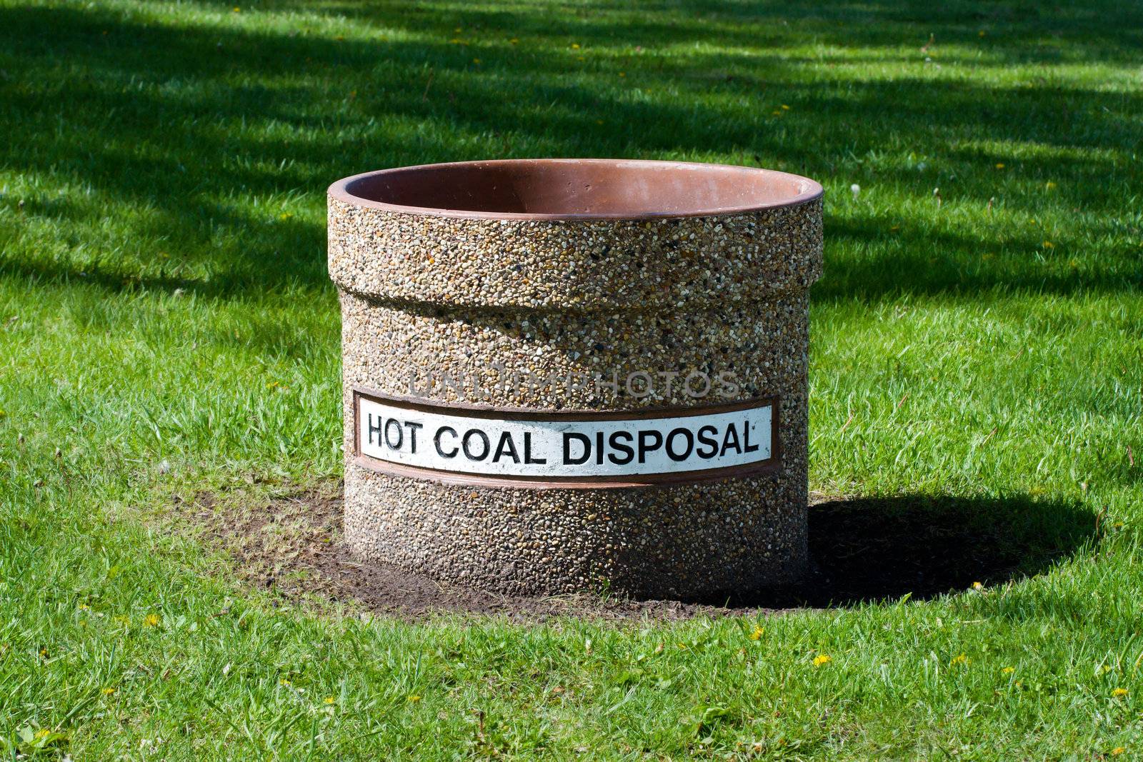 Hot Coal Disposal container at a park.