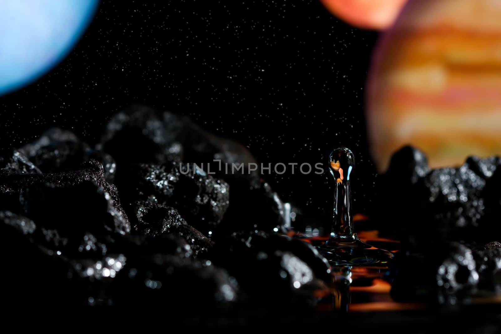 Abstract view of a solar system and rocky landscape.