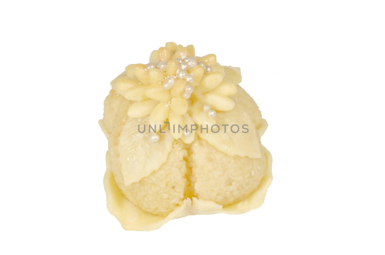 oriental pastry ornamented with pinion isolated on a white background