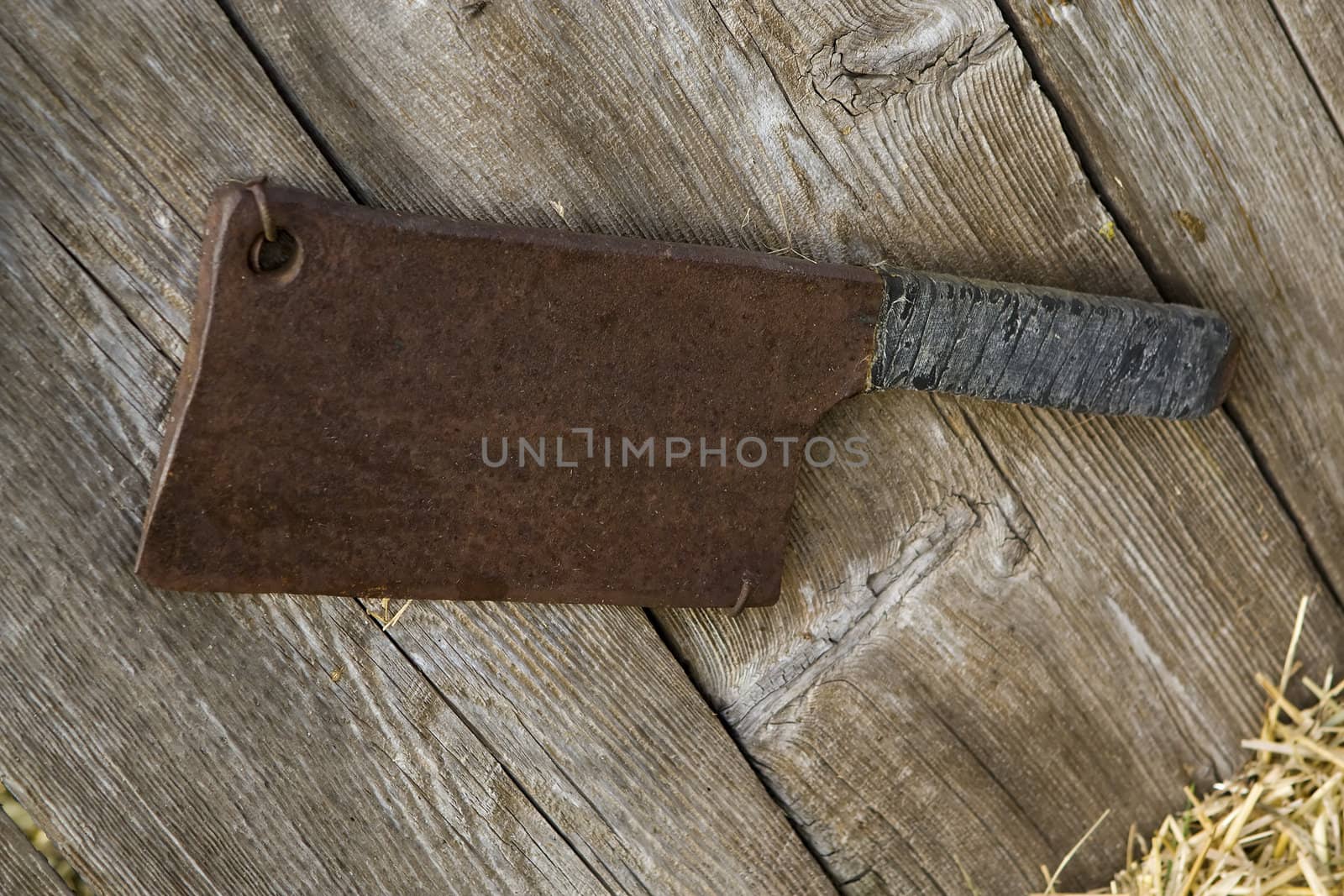 Old rusty meat cleaver by Coffee999