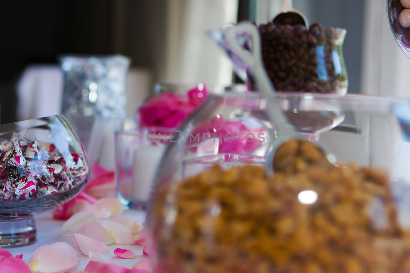 Wedding table of confections, goodies and chocolates.