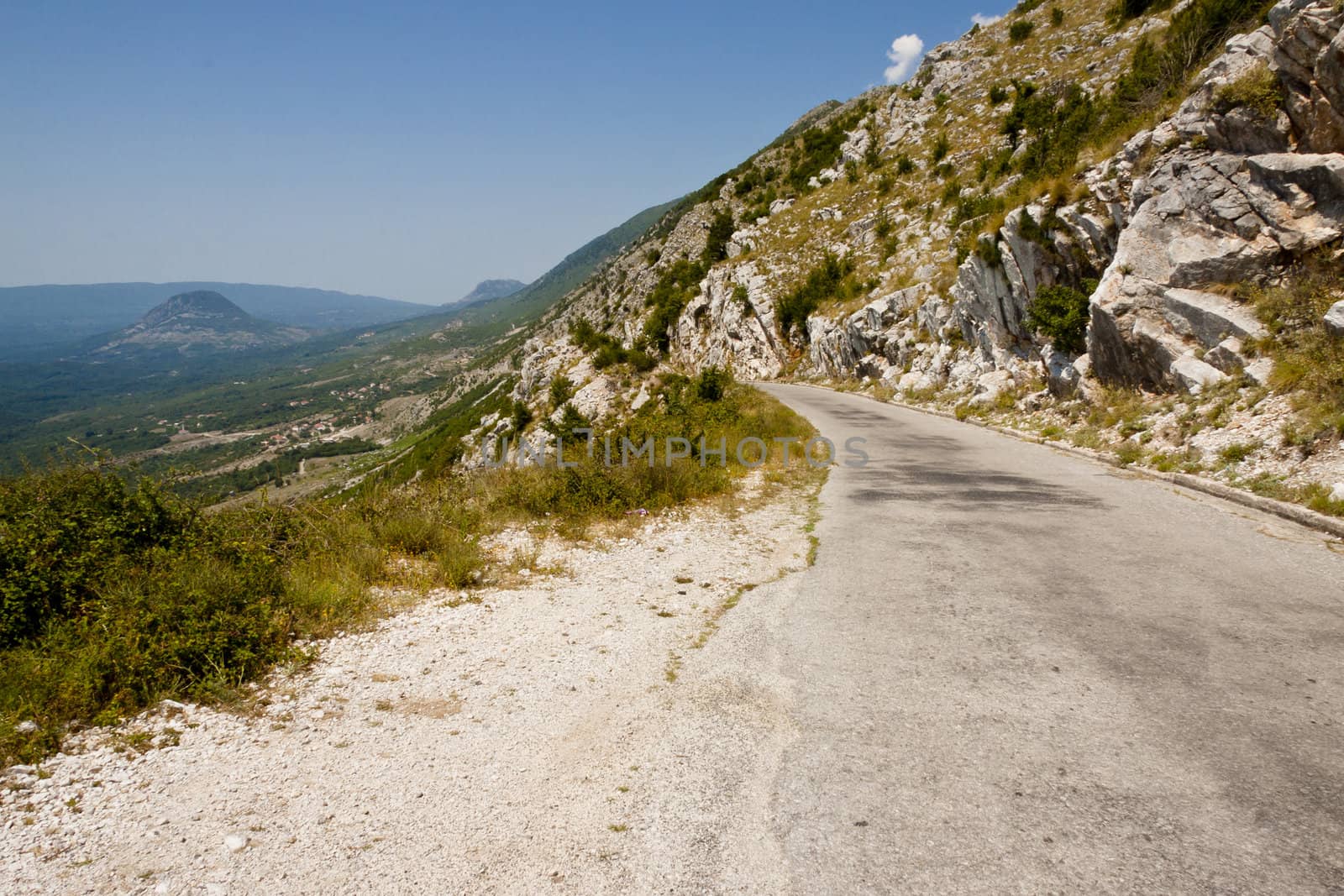 Narrow danger route in Montenegro near Skadarsko lake - Balkans