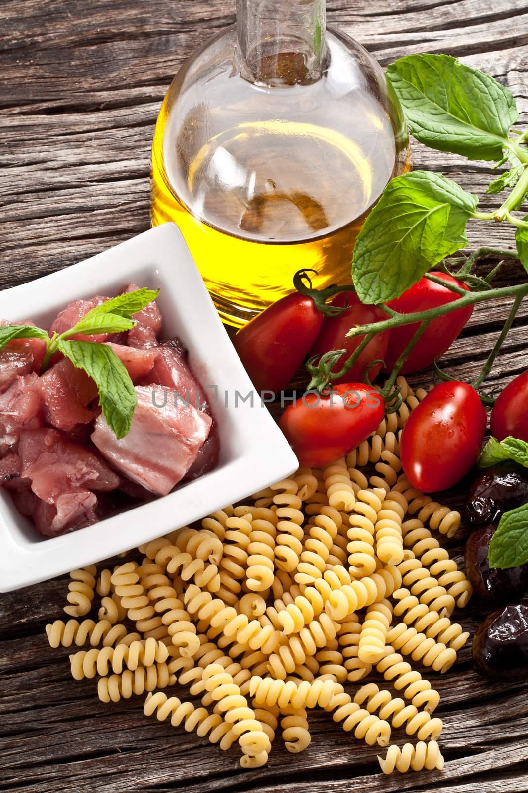 Italian Fusilli pasta with swordfish ingredients by maxg71