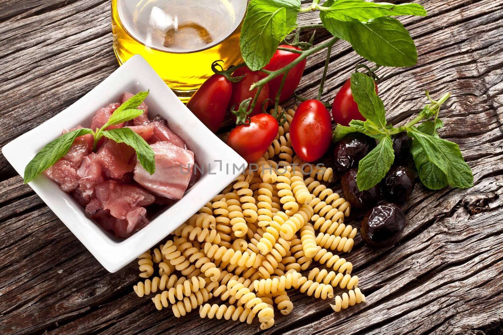 Italian Fusilli pasta with swordfish ingredients by maxg71