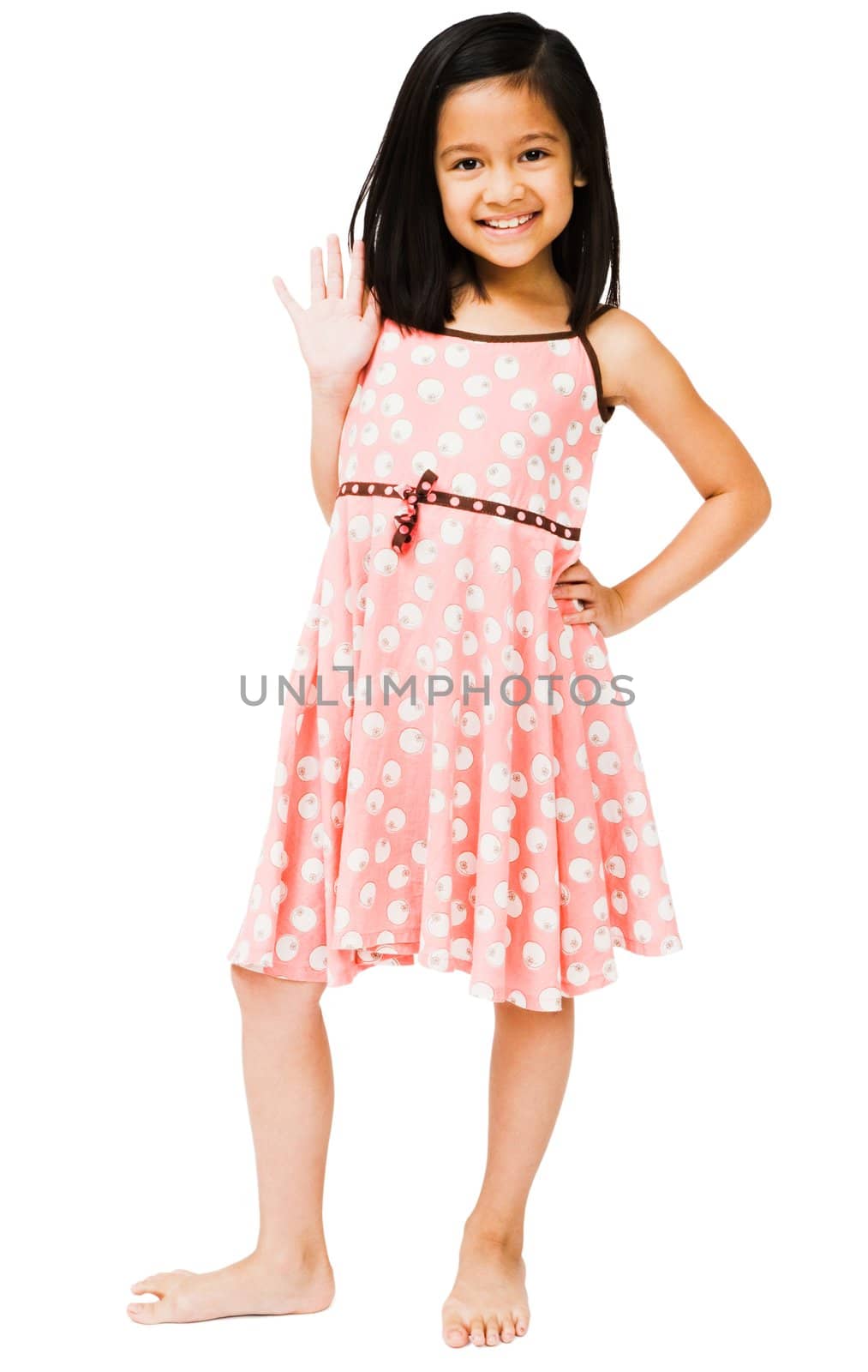 Portrait of a girl waving her hand and smiling isolated over white