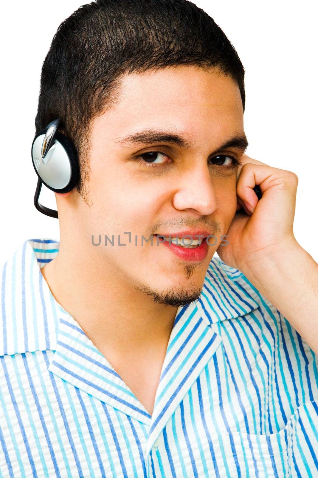 Close-up of a man listening to headphones isolated over white