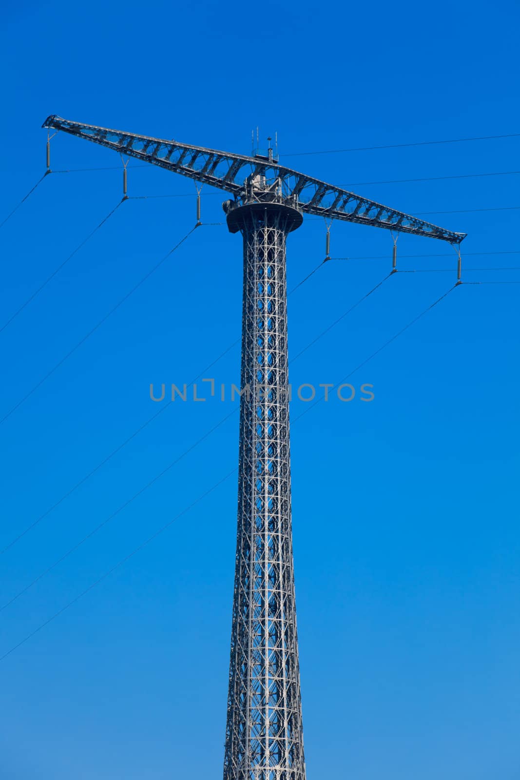 Communications tower with a beautiful blue sky