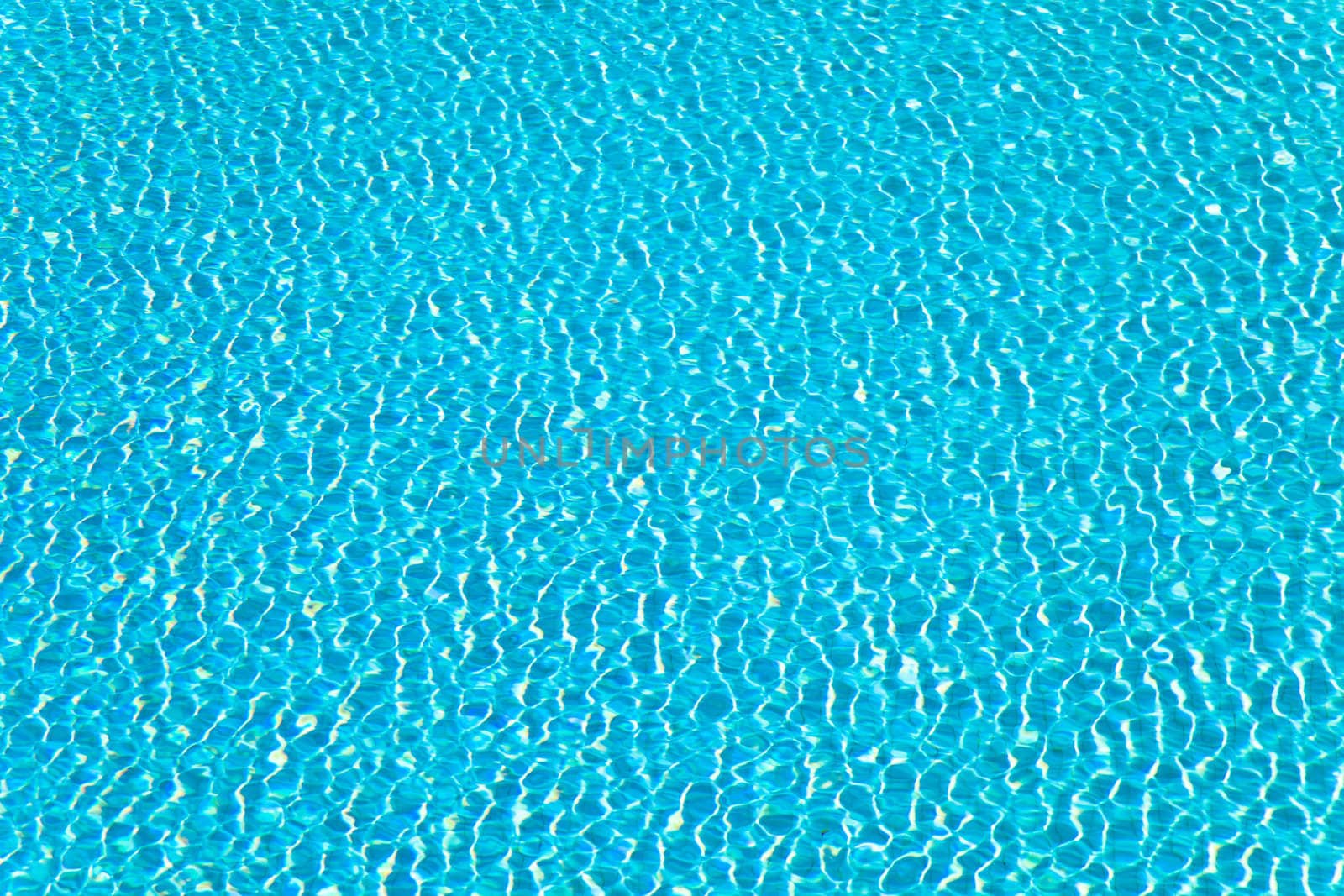 Abstract composition of the water of a swimming pool and its reflections