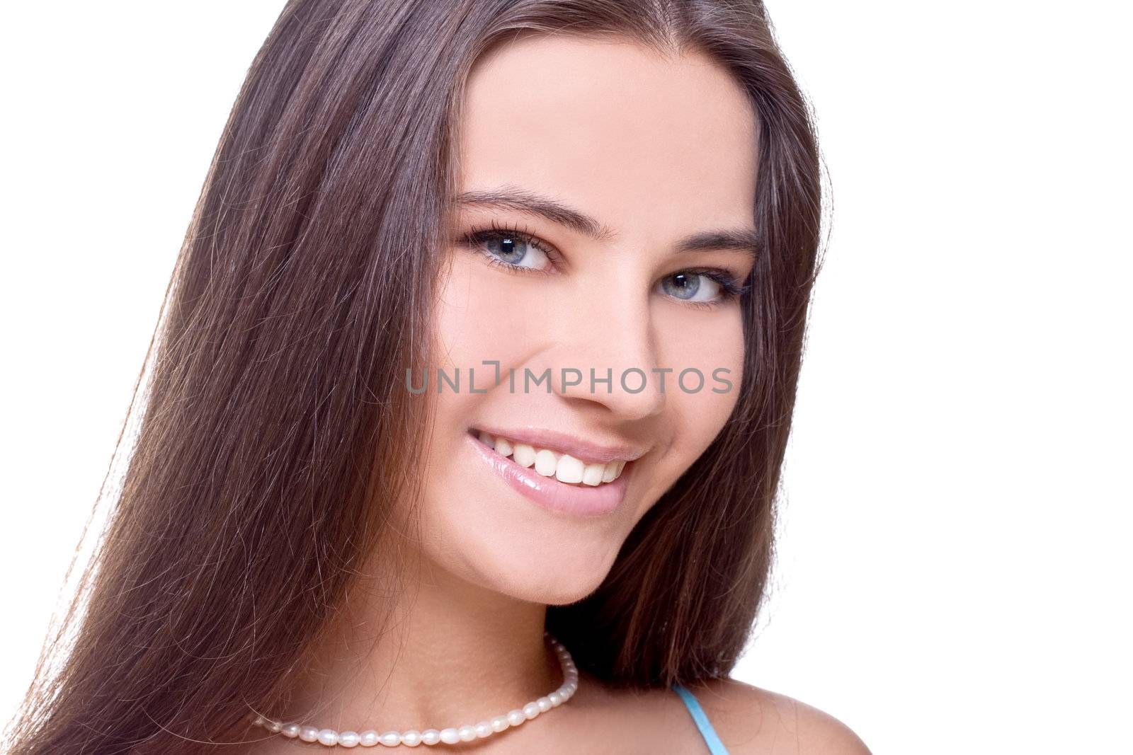 woman in a blue dress posing on a white background