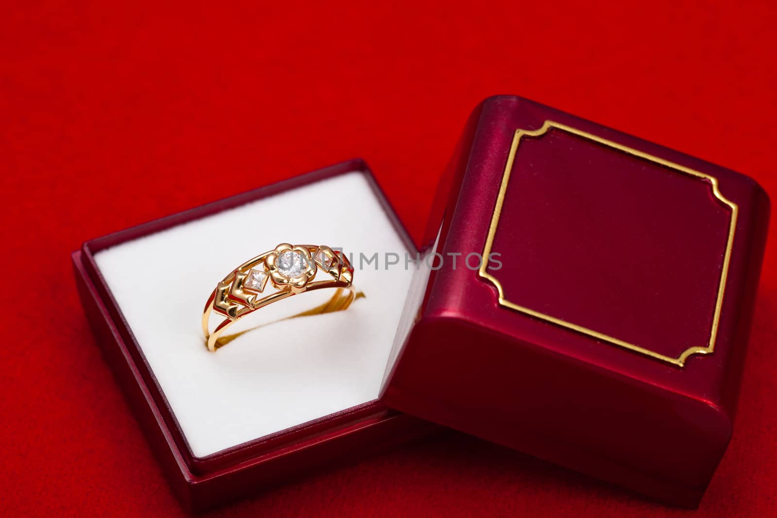 Fantastic gold ring adorned with several white zirconia