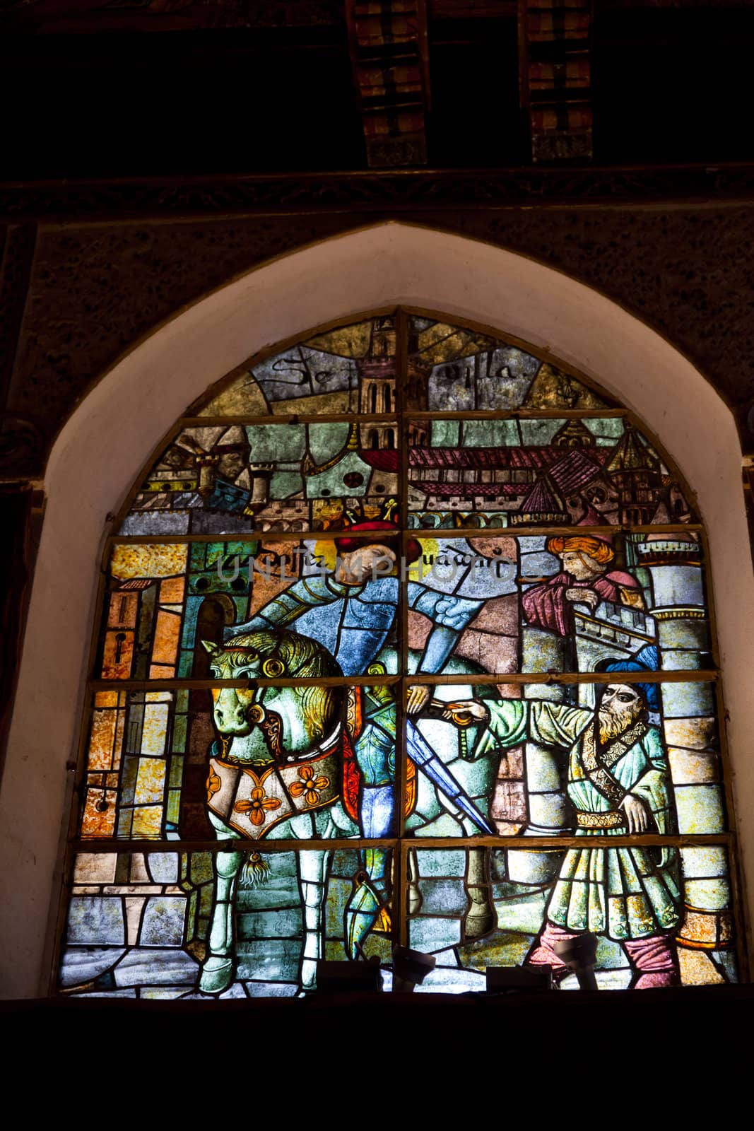 Wonderful ancient stained glass window formed of multiple colors